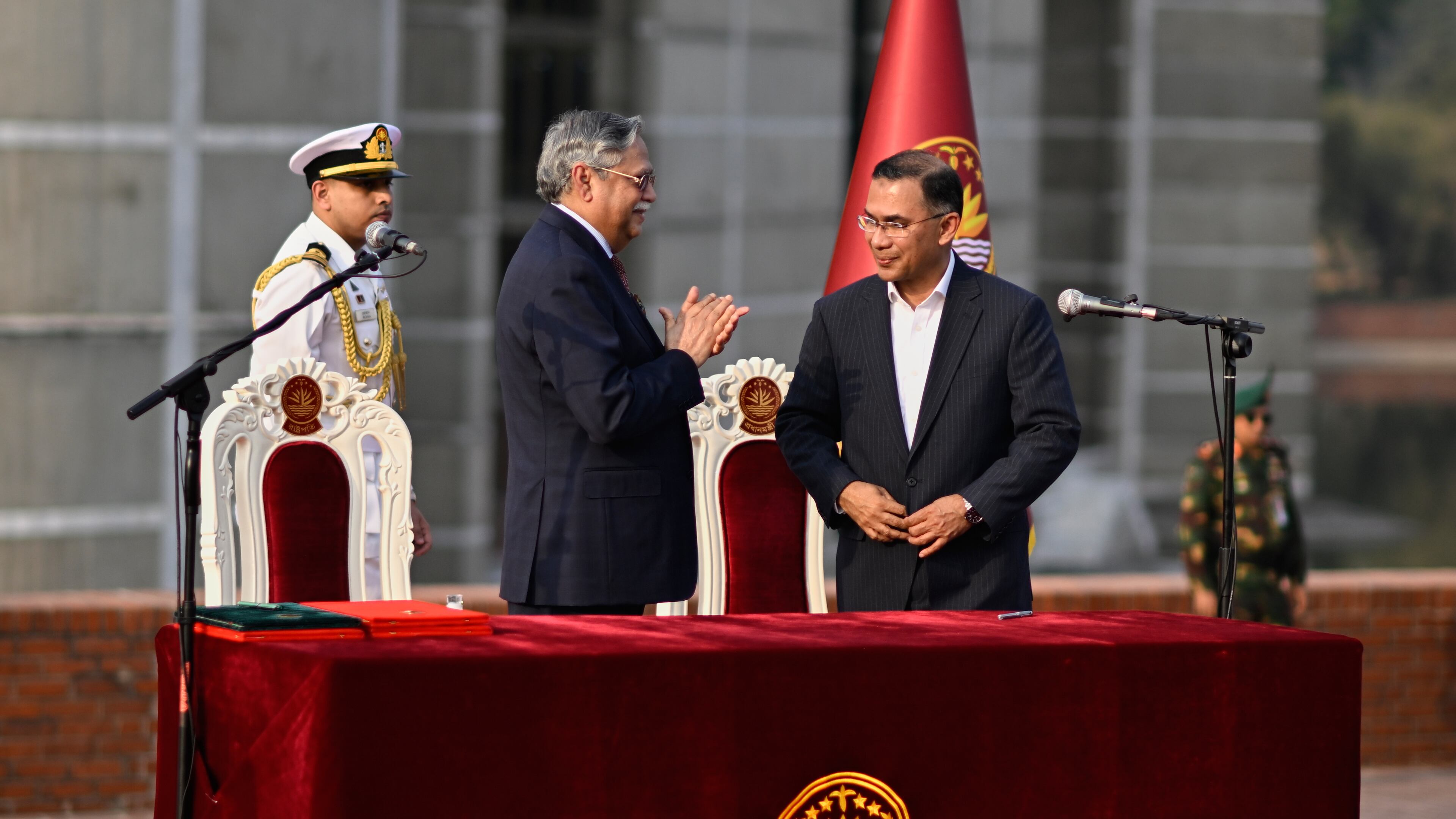President of Bangladesh Mohammed Shahabuddin, left, congratulates Tarique Rahman, Chairperson of the Bangladesh Nationalist Party after administering him oath of Prime Minister of Bangladesh at the National Parliament in Dhaka, Bangladesh, Tuesday, Feb. 17, 2026. (AP Photo/Mahmud Hossain Opu)