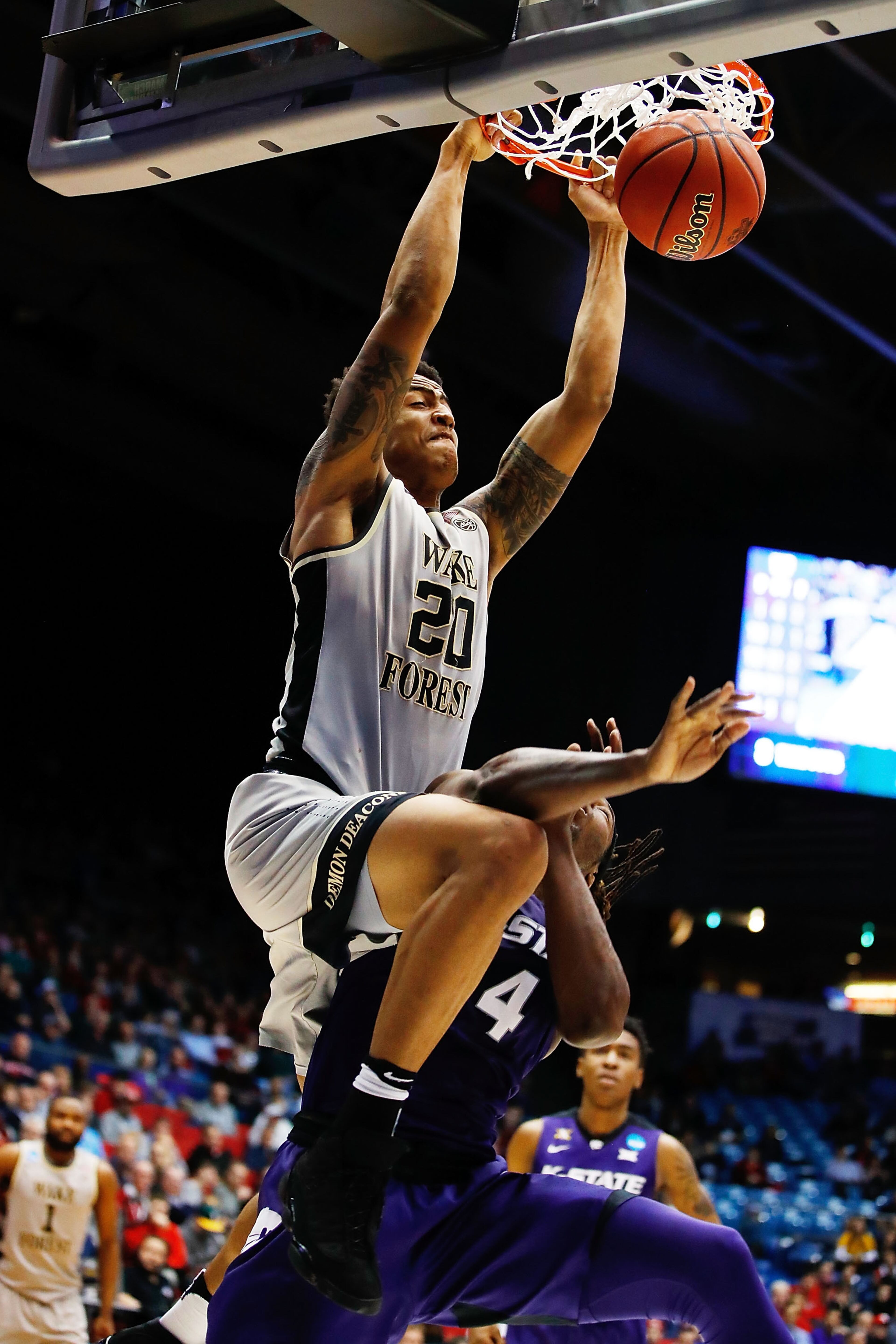 DAYTON, OH - MARCH 14: John Collins #20 of the Wake Forest Demon Deacons dunks the ball against D.J. Johnson #4 of the Kansas State Wildcats in the second half during the First Four game in the 2017 NCAA Men's Basketball Tournament at UD Arena on March 14, 2017 in Dayton, Ohio. (Photo by Gregory Shamus/Getty Images)