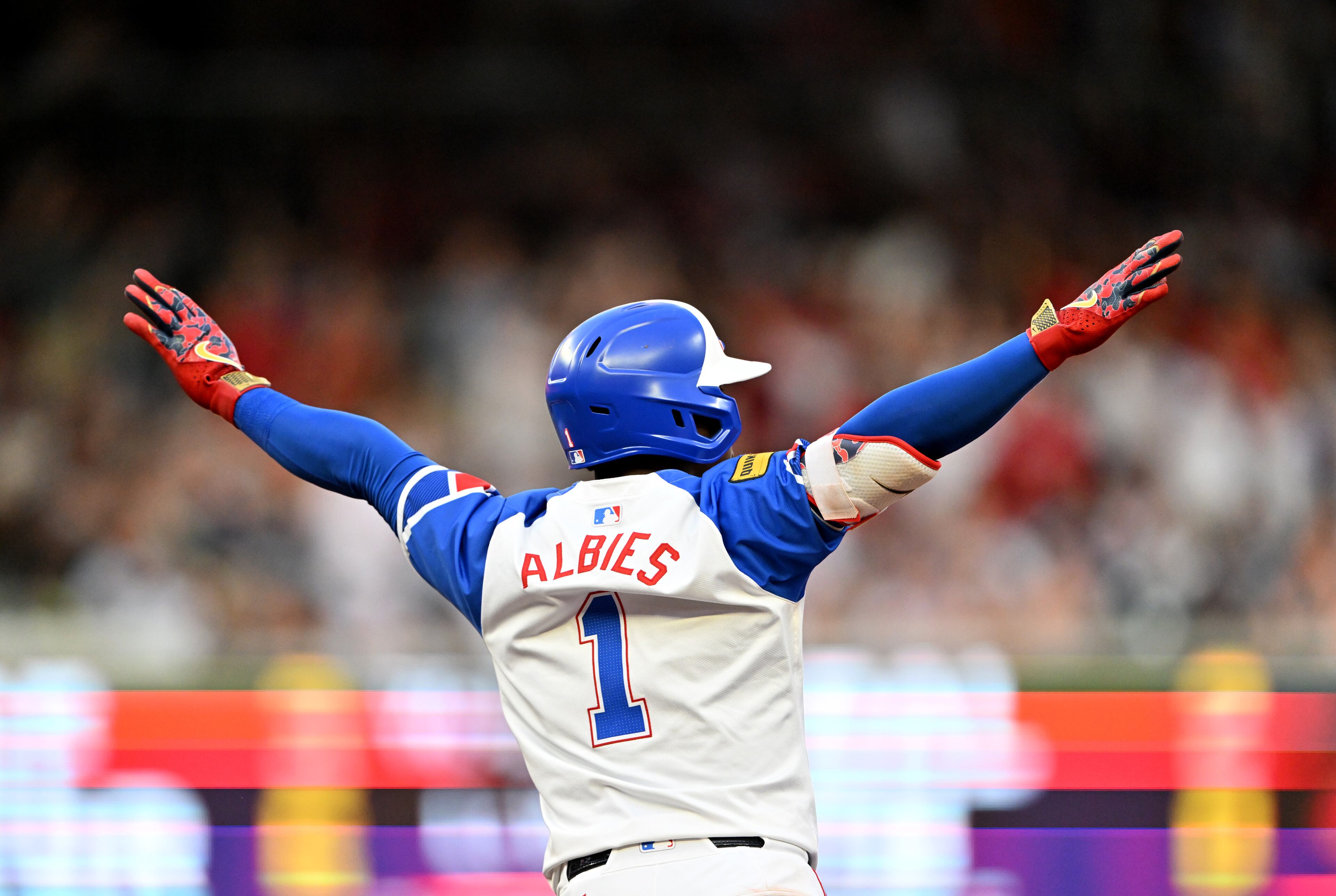 Atlanta Braves second base Ozzie Albies (1) celebrates as he circles the bases on a 3-run home run during the fourth inning of a baseball game at Truist Park, Saturday, July 19, 2025, in Atlanta. New York Yankees won 12-9 over Atlanta Braves. (Hyosub Shin / AJC)