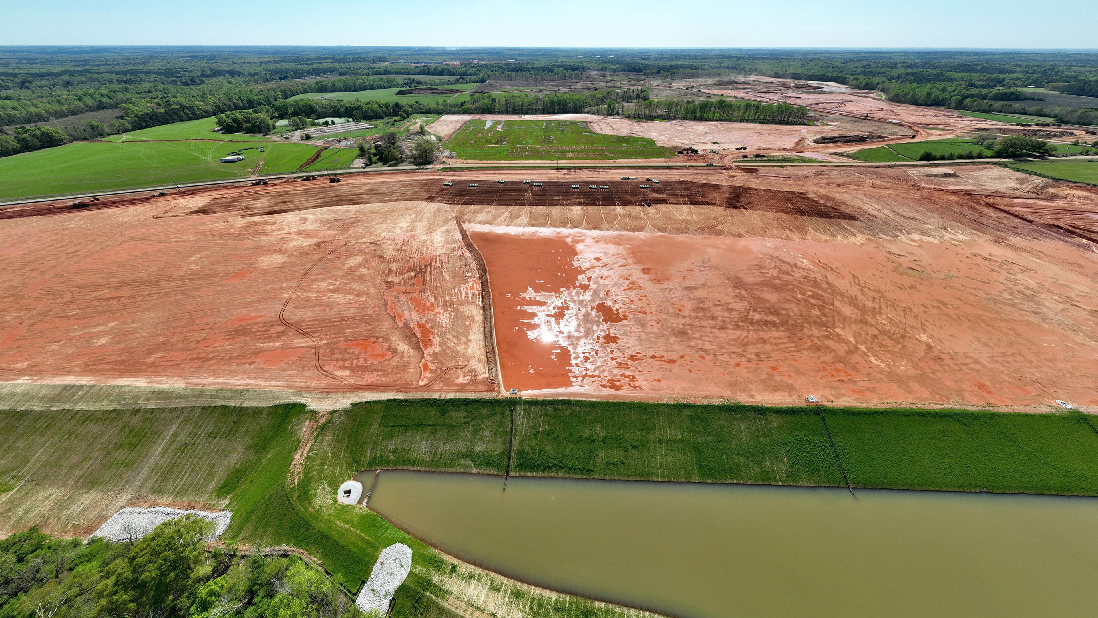Aerial photograph shows the 1,800-acre Rivian factory site in southern Walton and Morgan counties east of Atlanta, March 30, 2023, in Social Circle. (Hyosub Shin/The Atlanta Journal-Constitution/TNS)