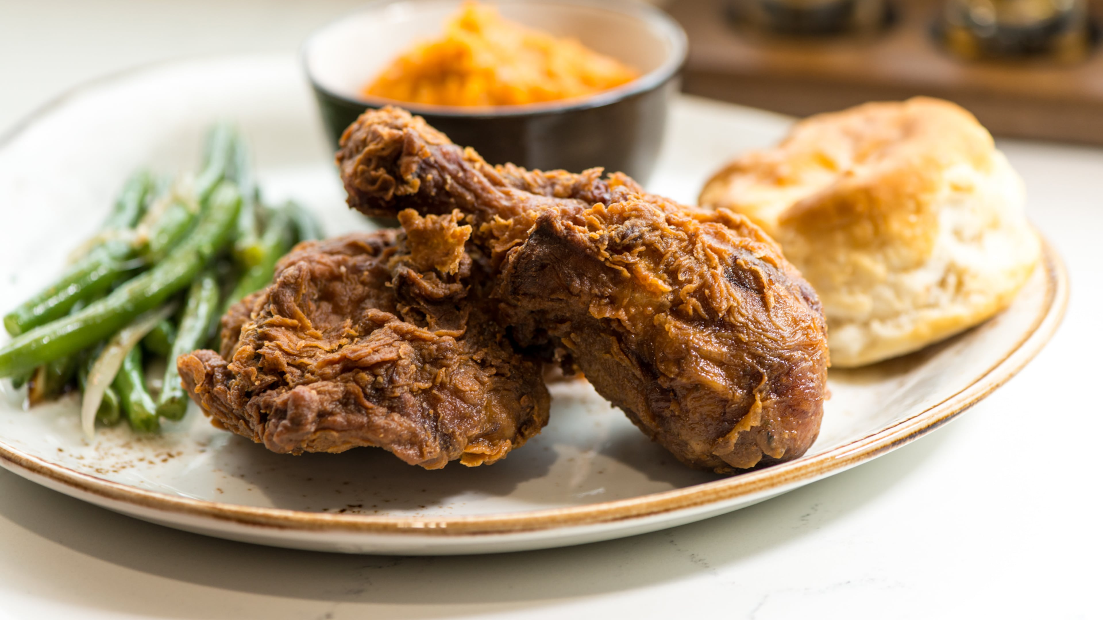 CONCOURSE D (D5) -- Chicken + Beer serves up dishes including chicken and waffles, battered catfish, sandwiches and salads. The restaurant is owned by rapper, Ludacris. Photo credit- Mia Yakel.