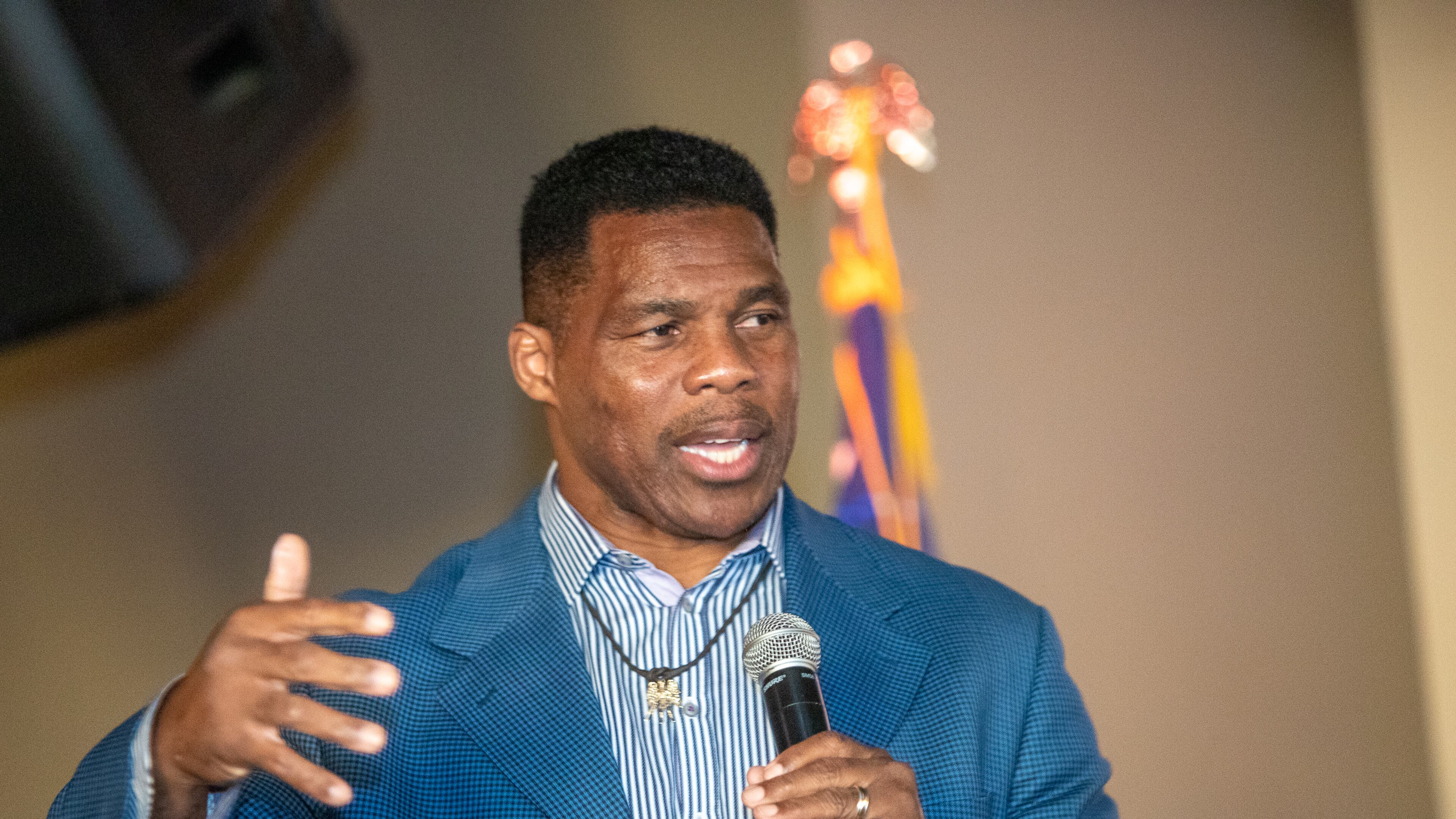 Republican U.S. Senate hopeful Herschel Walker was hit this week by both a story alleging he paid for a girlfriend's abortion in 2009 and tweets from his son saying he had to flee from his father out of fear of violence. (Jenni Girtman for The Atlanta Journal-Constitution)