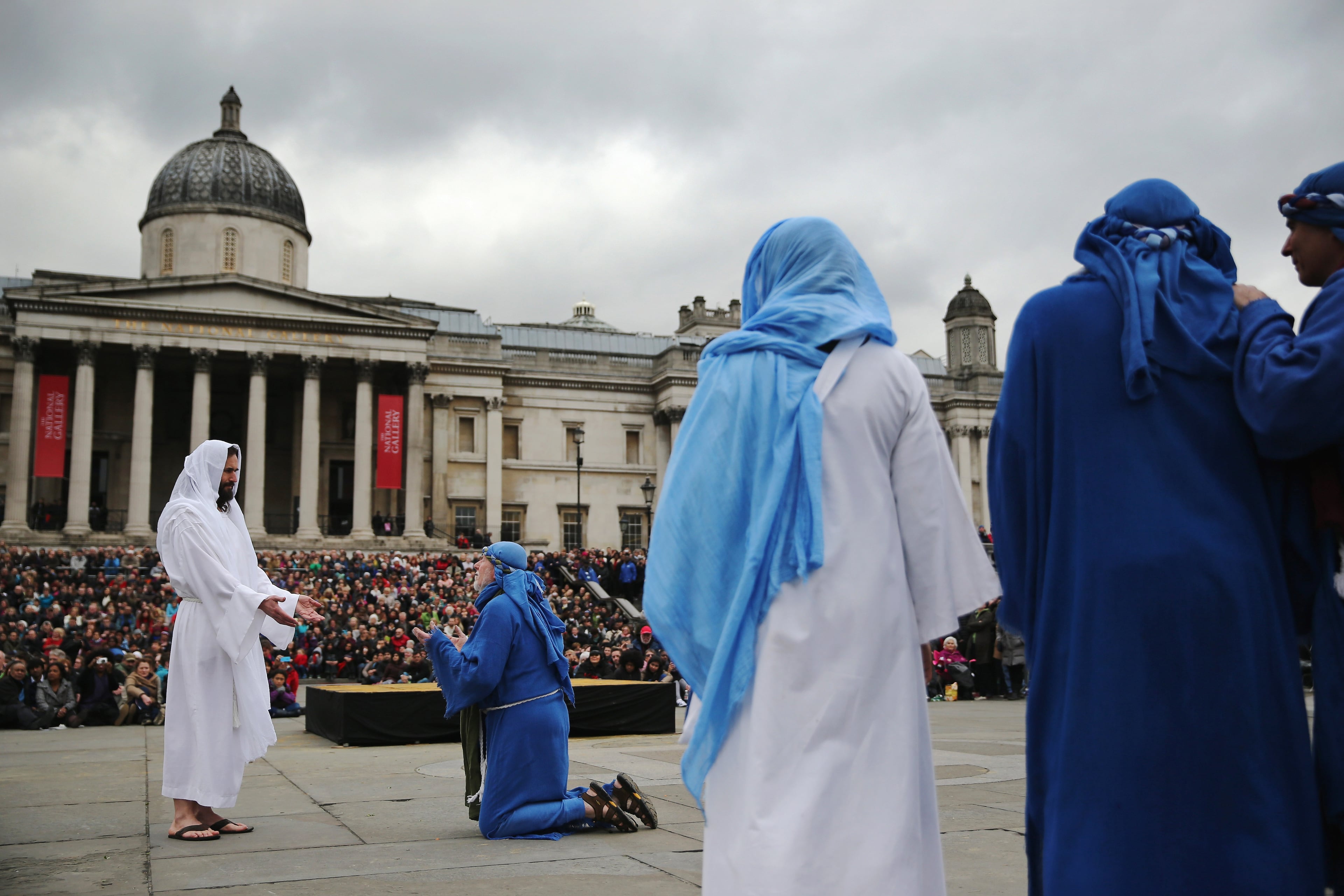 LONDON, ENGLAND - APRIL 03: Actors perform The Wintershall's 'The Passion of Jesus' production in front of crowds on Good Friday in Trafalgar Square on April 3, 2015 in London, England. Good Friday is a Christian religious holiday before Easter Sunday, which commemorates the crucifixion of Jesus Christ on the cross. The Wintershall's theatrical production of 'The Passion of Jesus' includes a cast of 100 actors, horses, a donkey and authentic costumes of Roman soldiers in the 12th Legion of the Roman Army. (Photo by Dan Kitwood/Getty Images)