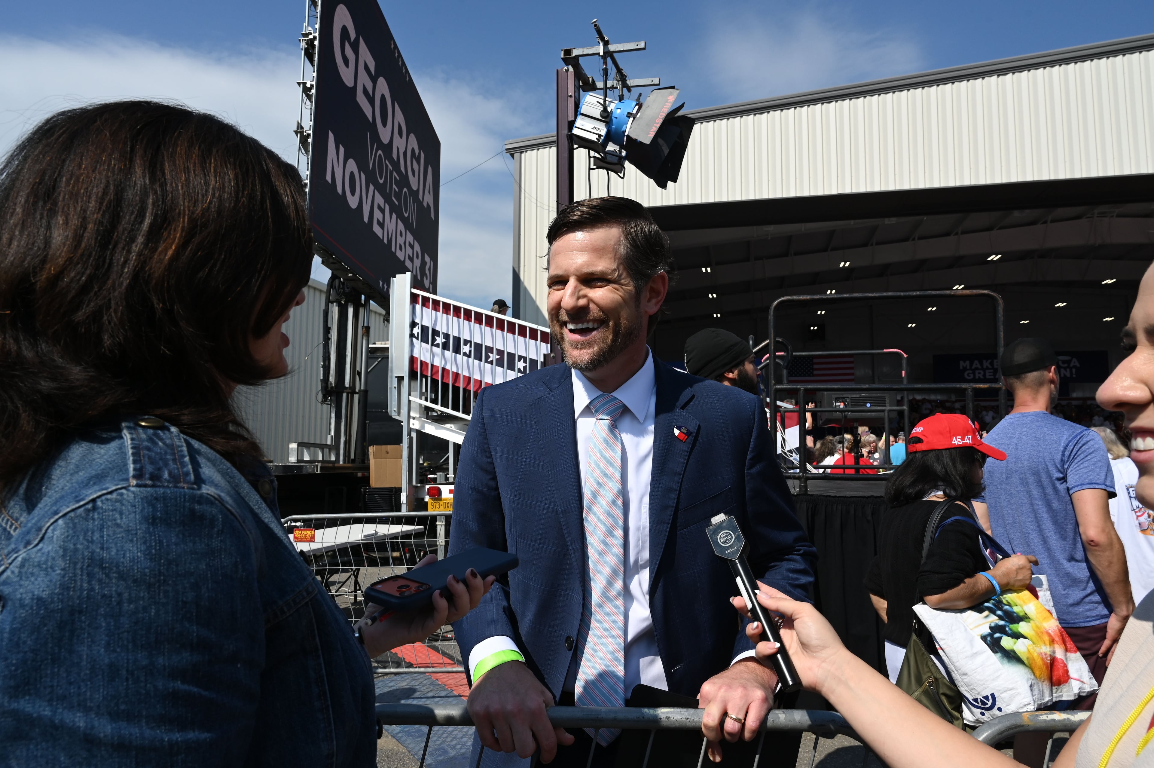 Brian Strickland, candidate for Georgia attorney general, speaks to members of the press before a campaign rally at Dalton Municipal Airport on Friday, Oct. 16, 2026, in Dalton. (Hyosub Shin/AJC)