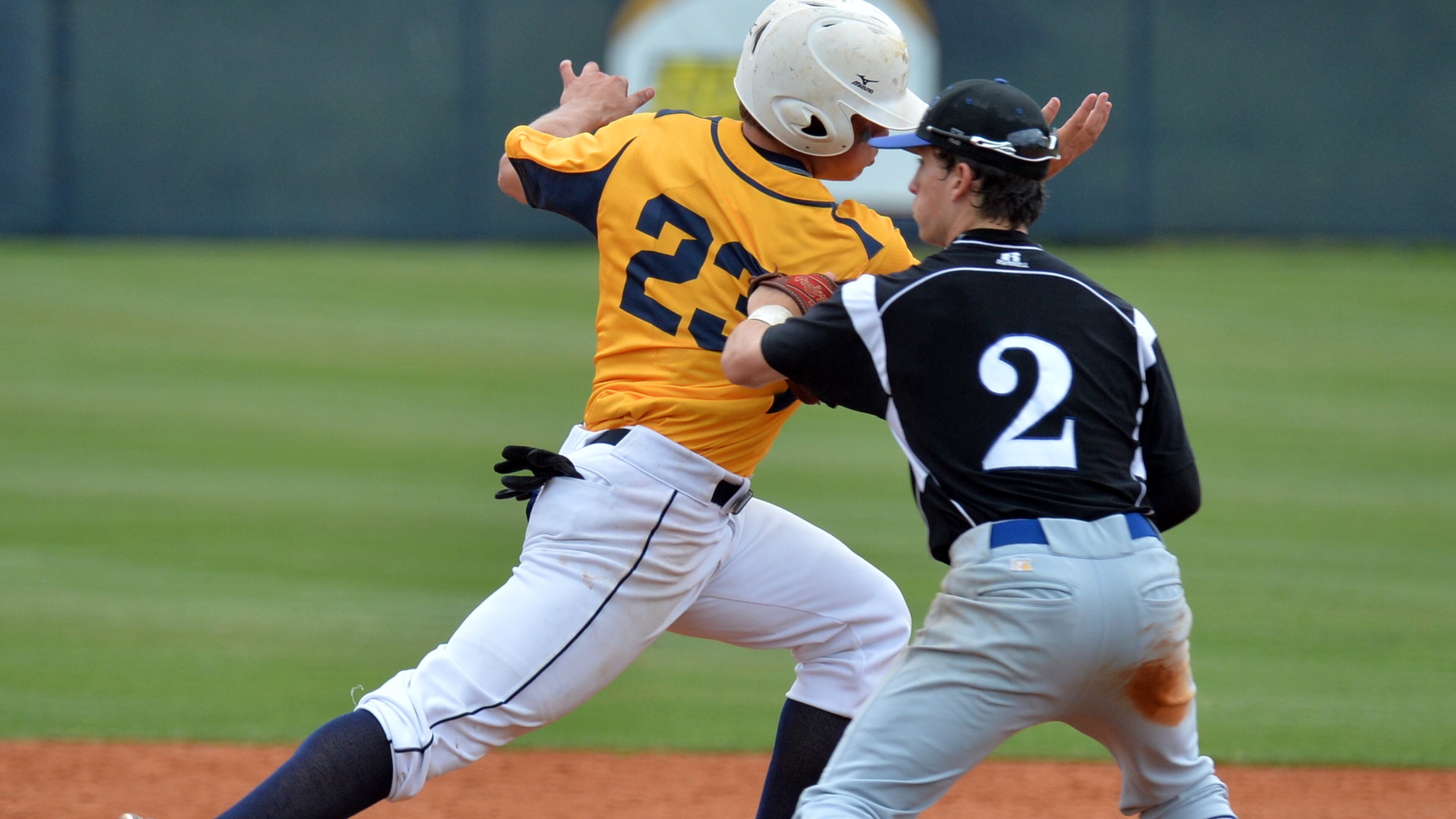 May 18, 2013 McDonough - Mt. Paran Jake Palomaki (2) tags out Eagle's Landing Matthew Hammers (23) in the 6th inning during game one of a double header at Eagle's Landing Christian Academy in McDonough on Saturday, May 18, 2013. Eagle's Landing won the game one of a double header 5-1 over Mt. Paran. HYOSUB SHIN / HSHIN@AJC.COM