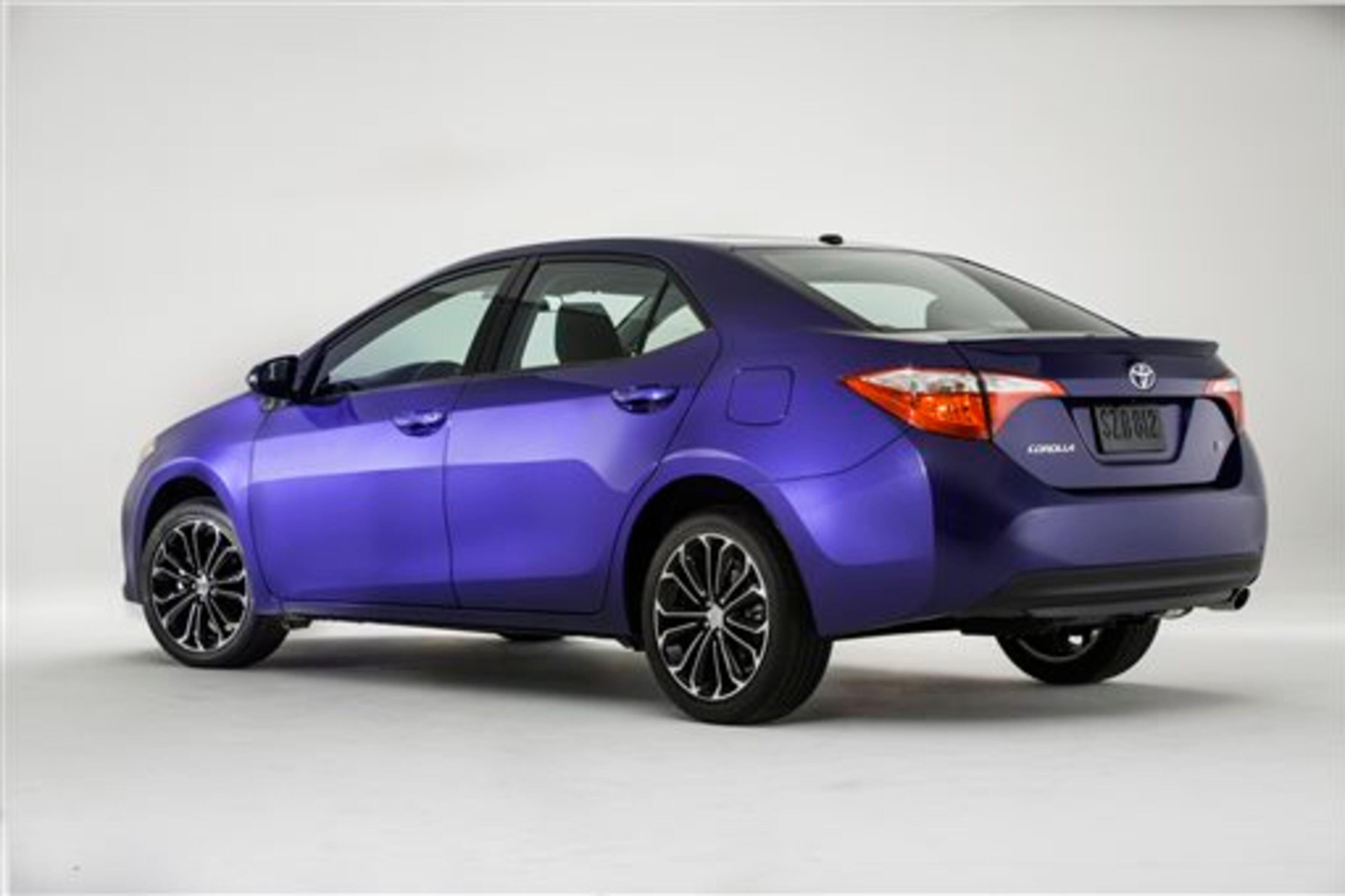 This June 6, 2013 product publicity image provided by Toyota shows the company's new Corolla revealed in Santa Monica, Calif. Toyota took a risk with an edgier, more chiseled design, and LED headlights give the car a more premium look. The 11th generation of the Corolla, one of the best-selling small cars on the planet, goes on sale in September. (AP Photo/Toyota, File)