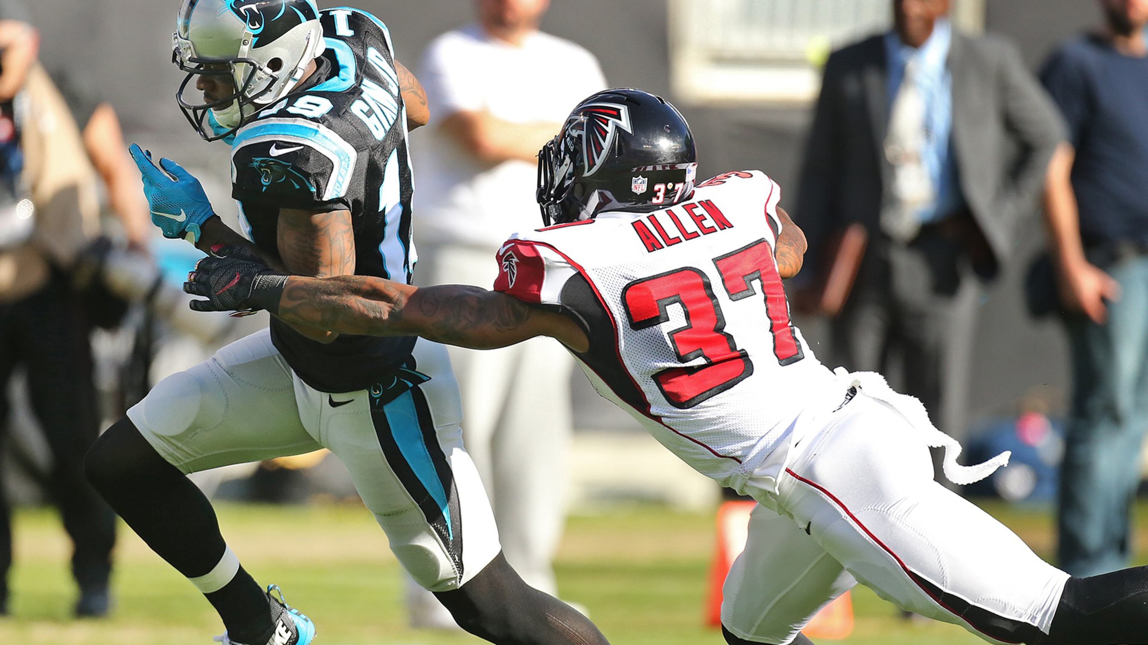 Panthers wide receiver Ted Ginn, Jr., catches his second touchdown pass of the day as Ricardo Allen can't keep up. Curtis Compton/ccompton@ajc.com