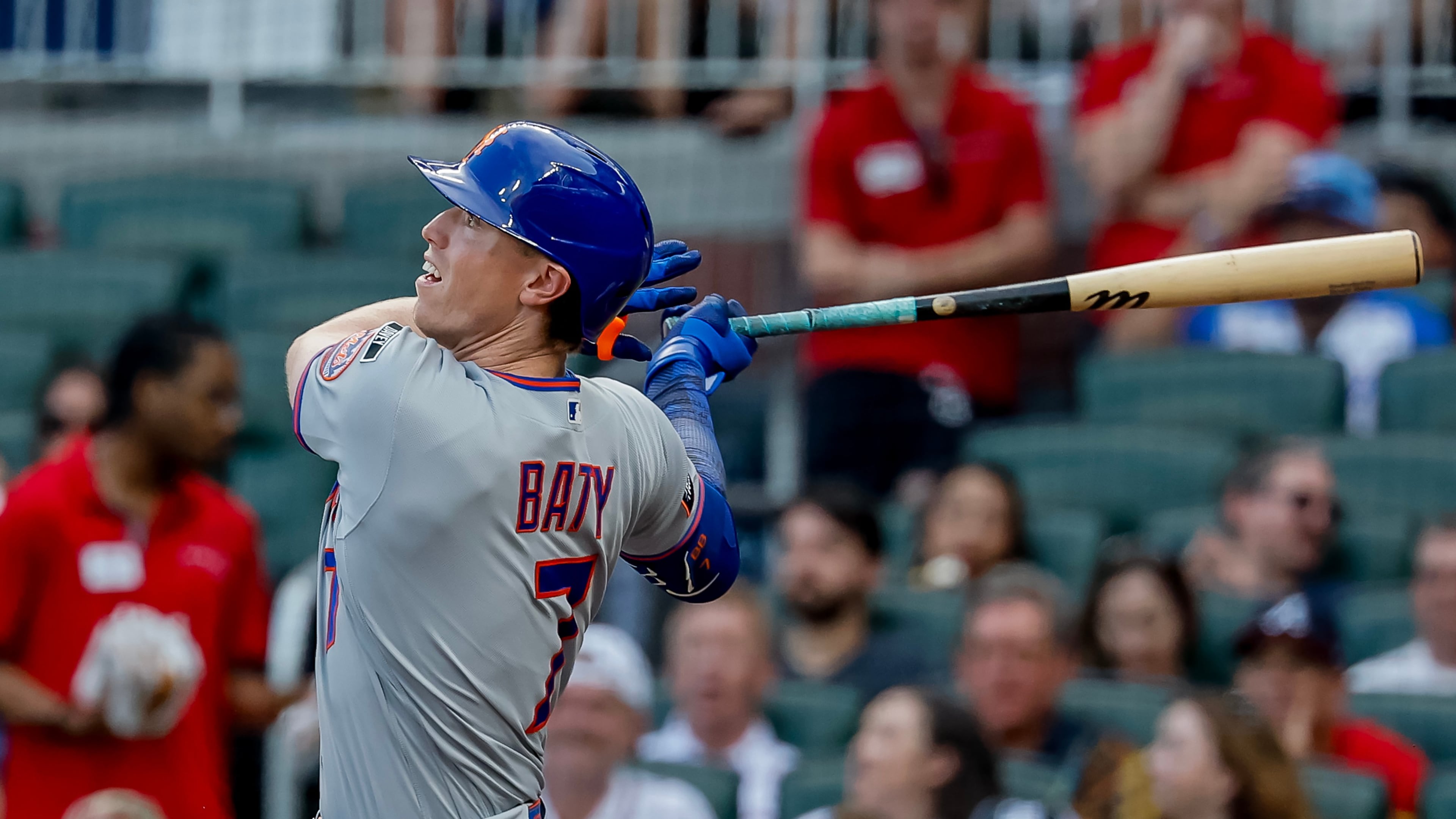 New York Mets' Brett Baty follows through on a grand slam against the Atlanta Braves during the first inning of a baseball game, Monday, Aug. 10, 2026, in Atlanta. (AP Photo/Erik S. Lesser)