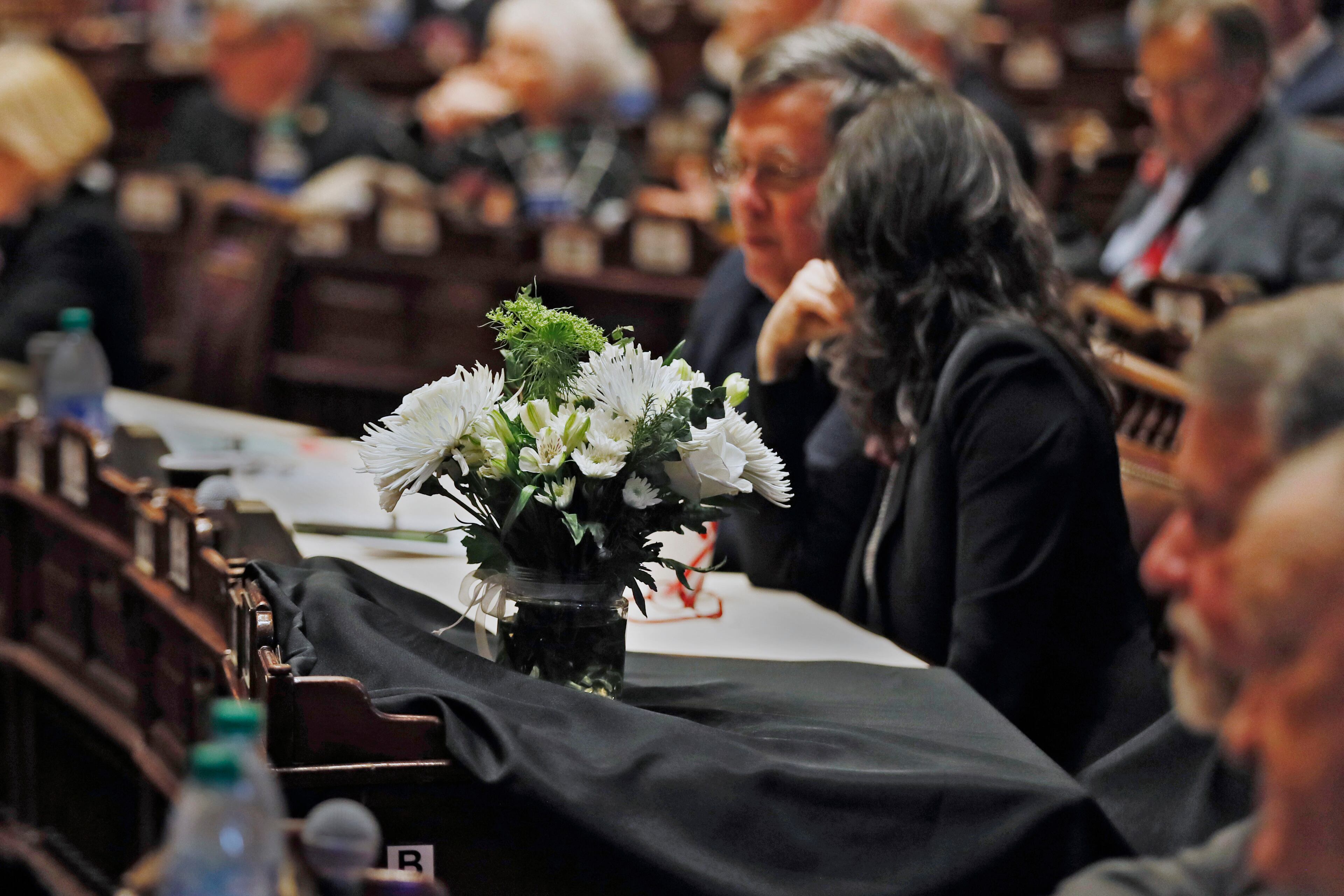 January 13, 2020 - Atlanta - Flowers and a black drape mark the desk of Georgia House Rules Chairman Jay Powell, who died during a retreat of Republican legislative leaders last November. The Georgia General Assembly started its 2020 session amid a backdrop of an election year. ACLU volunteers greeted lawmakers and offered copies of the constitution. Bob Andres / bandres@ajc.com