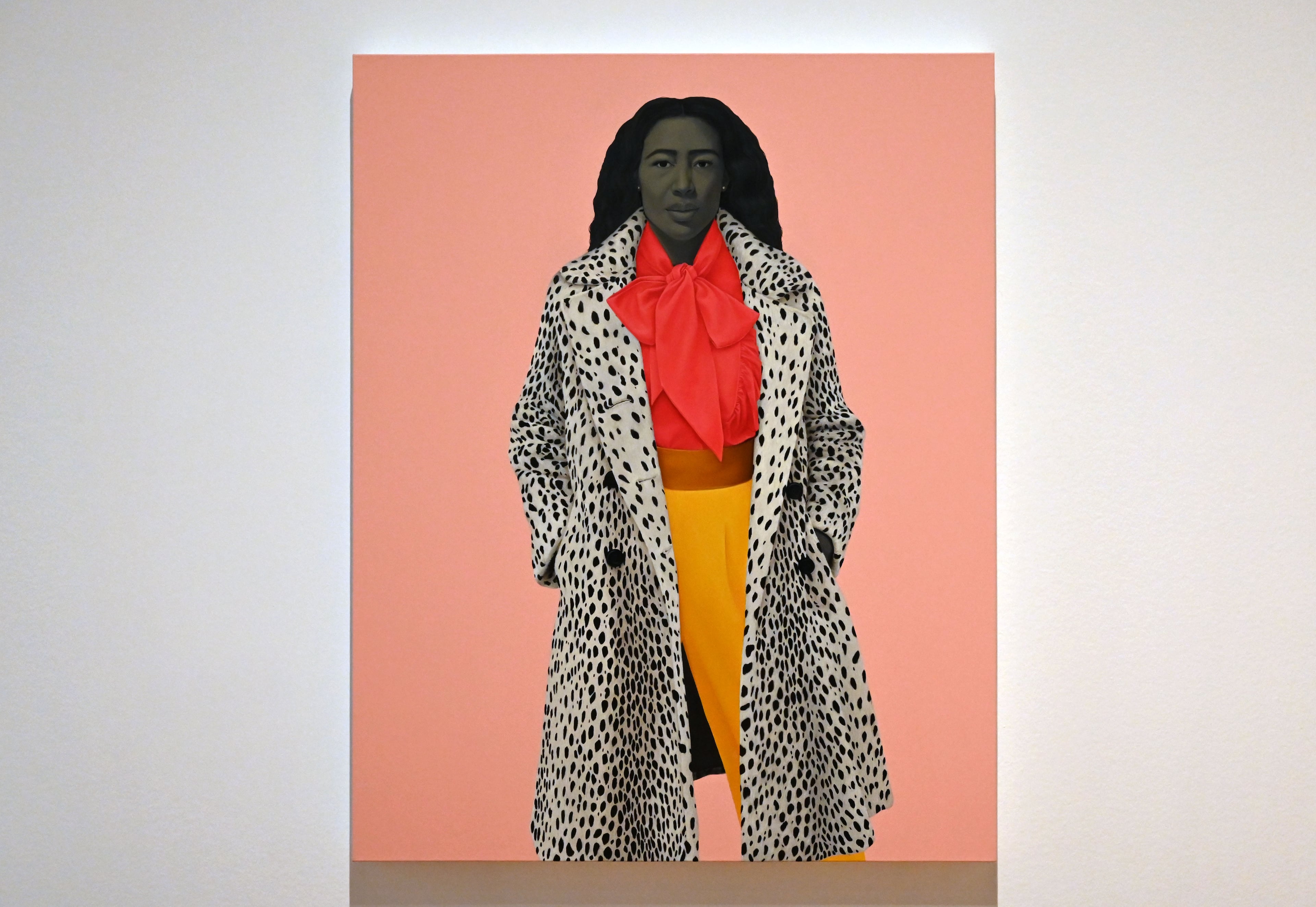 The fur from a black-and-white animal print coat on “As Soft As She Is…” prickles through the painting. (Hyosub Shin/AJC)