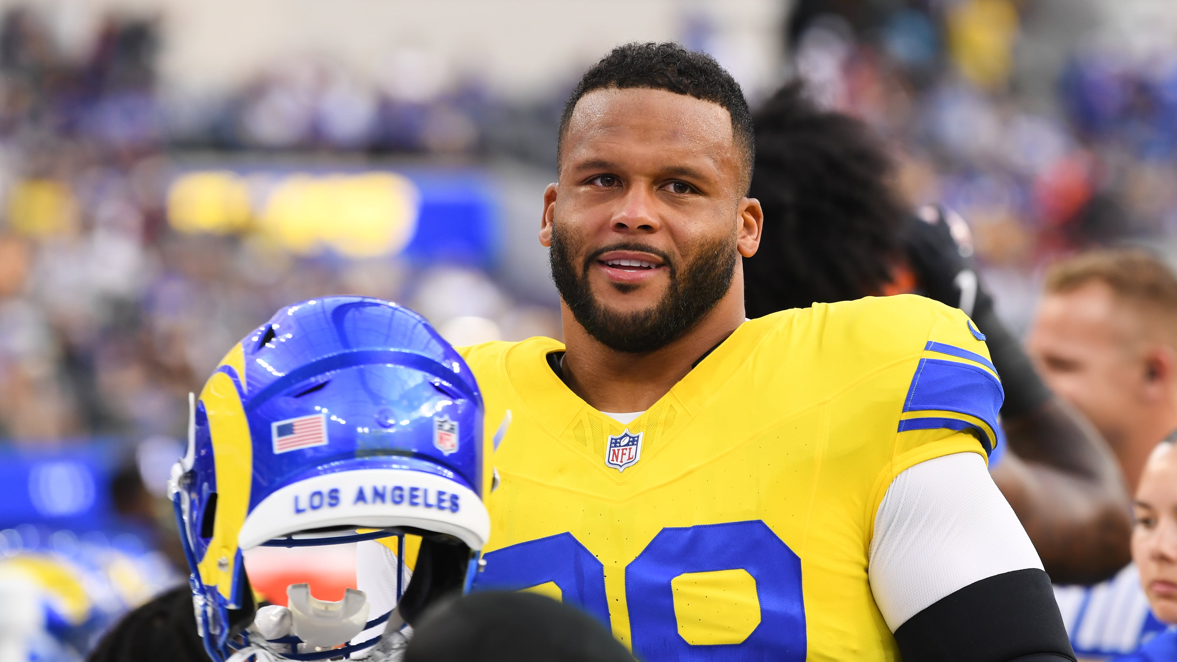 Los Angeles Rams defensive end Aaron Donald looks on from the bench before an NFL football game against the New York Giants in Inglewood, Calif., Monday, Sept. 21, 2026. (AP Photo/Katie Chin)