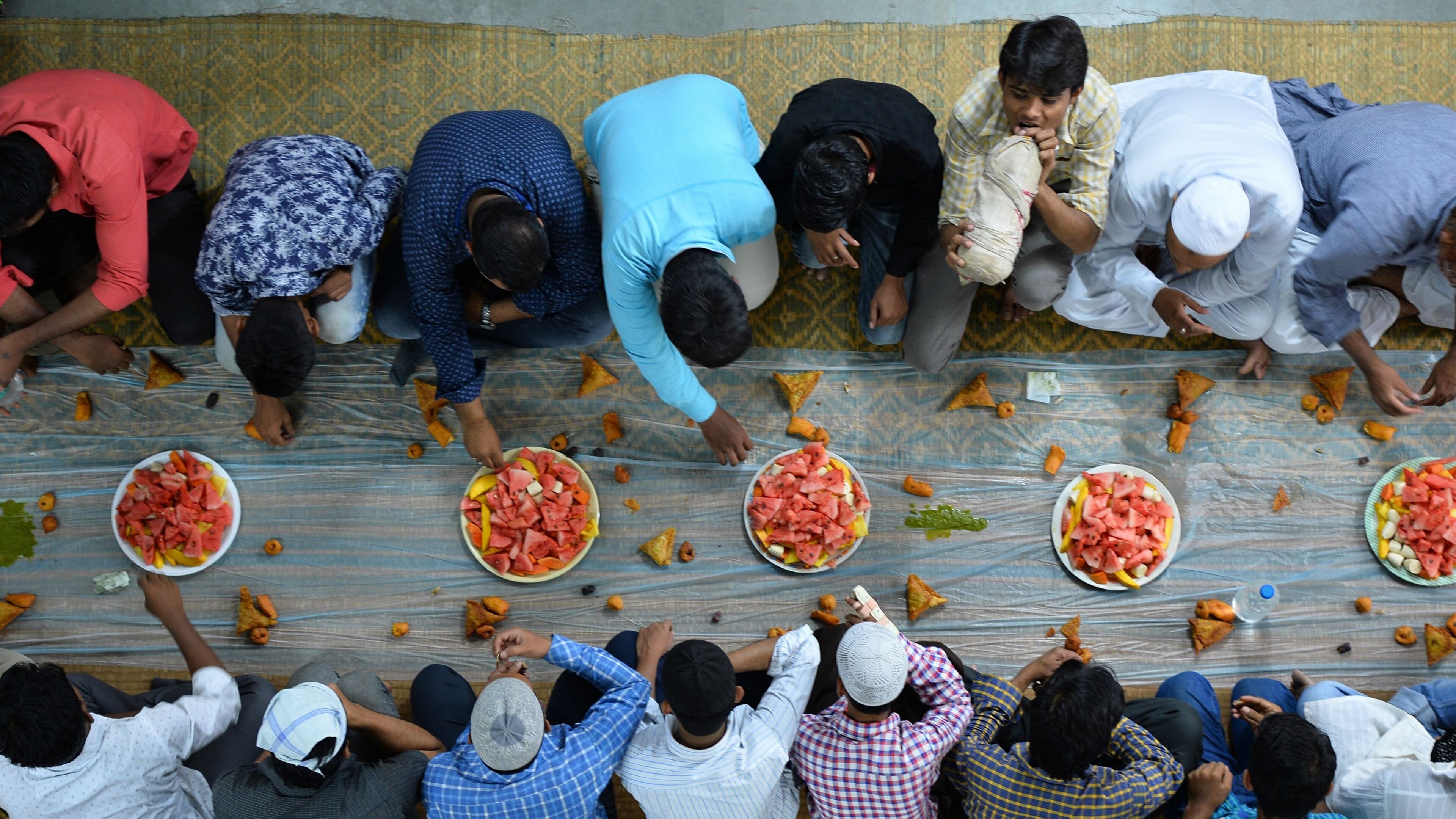 Muslims breaking their Ramadan fast with 'iftar'.
