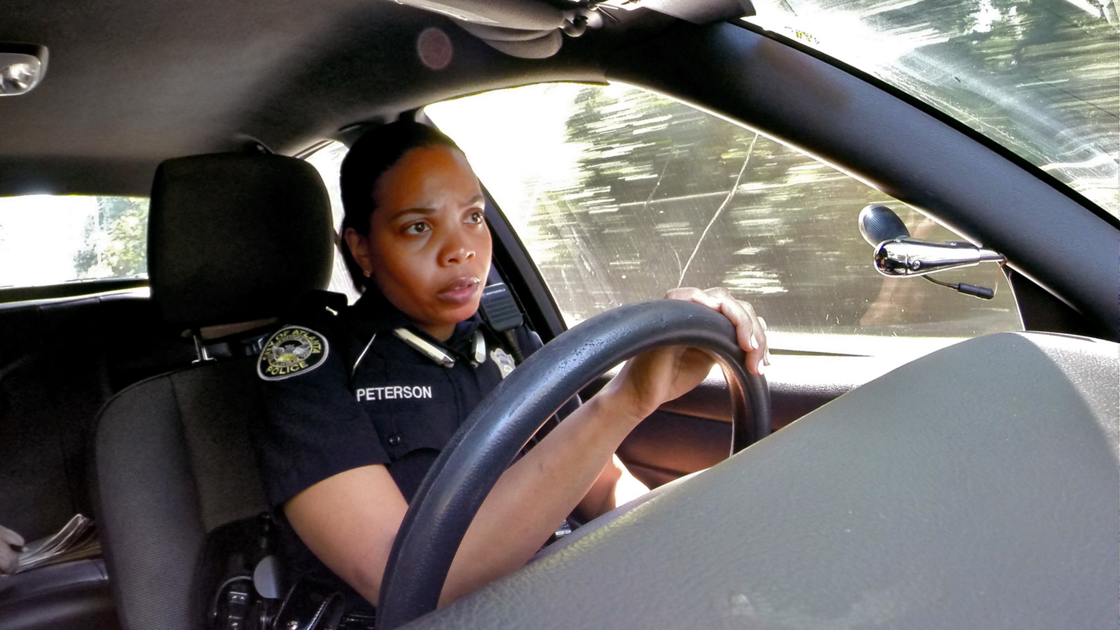 July 26, 2016 - Atlanta, GA - Officer Dwan Peterson on patrol in the Atlanta Zone 4 precinct. AJC journalists ride along with two Atlanta police patrol officers -- one black and one white -- in the wake of the fatal shootings in Minnesota, Louisiana and Texas.