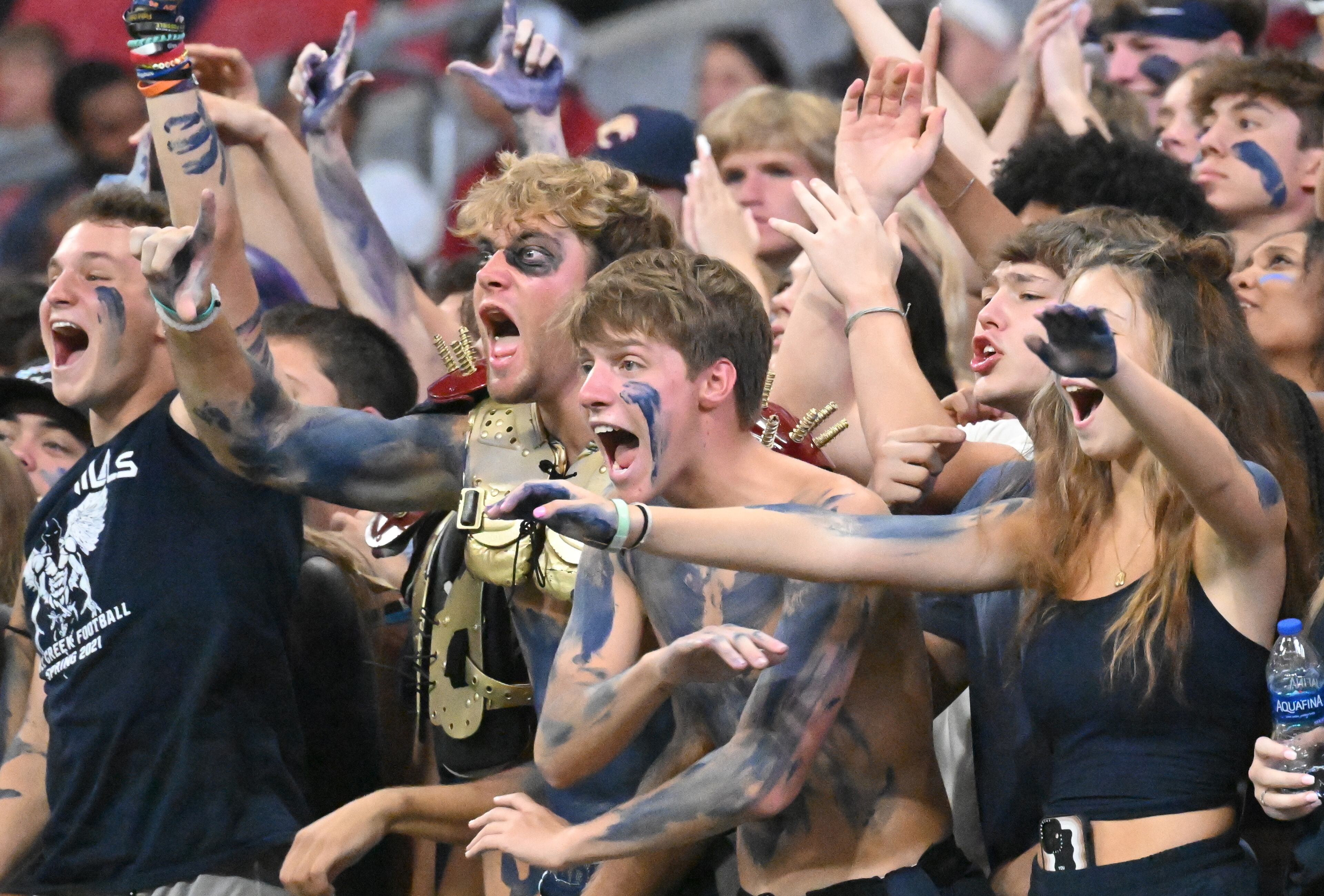 August 20 , 2022 Atlanta - Mill Creek's fans cheer for their team during the 2022 Corky Kell Classic at Mercedes Benz Stadium on Saturday, August 20, 2022. (Hyosub Shin / Hyosub.Shin@ajc.com)