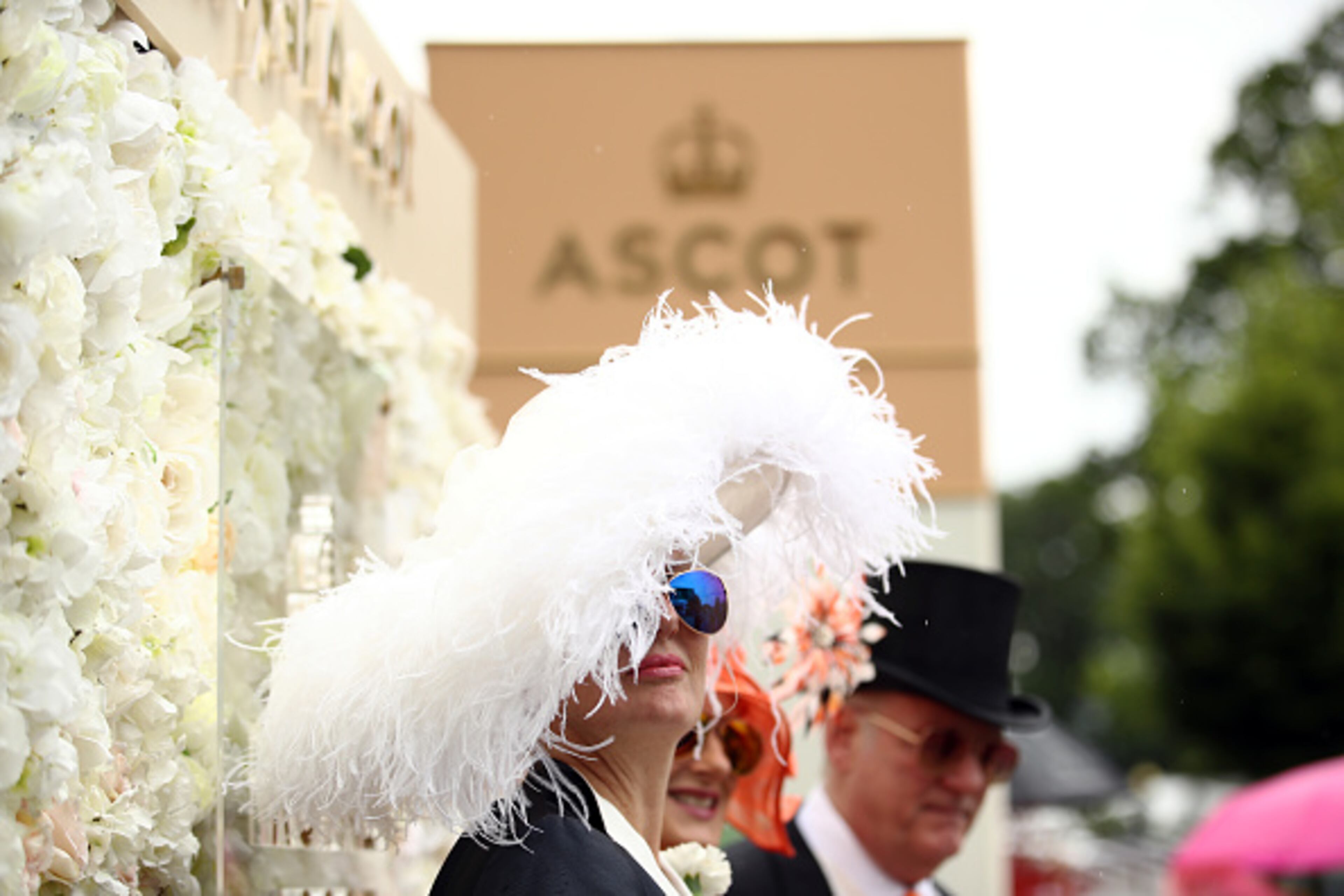 ASCOT, ENGLAND - JUNE 18: Racegoers attend day one of Royal Ascot at Ascot Racecourse on June 18, 2019 in Ascot, England. (Photo by Bryn Lennon/Getty Images for Ascot Racecourse)