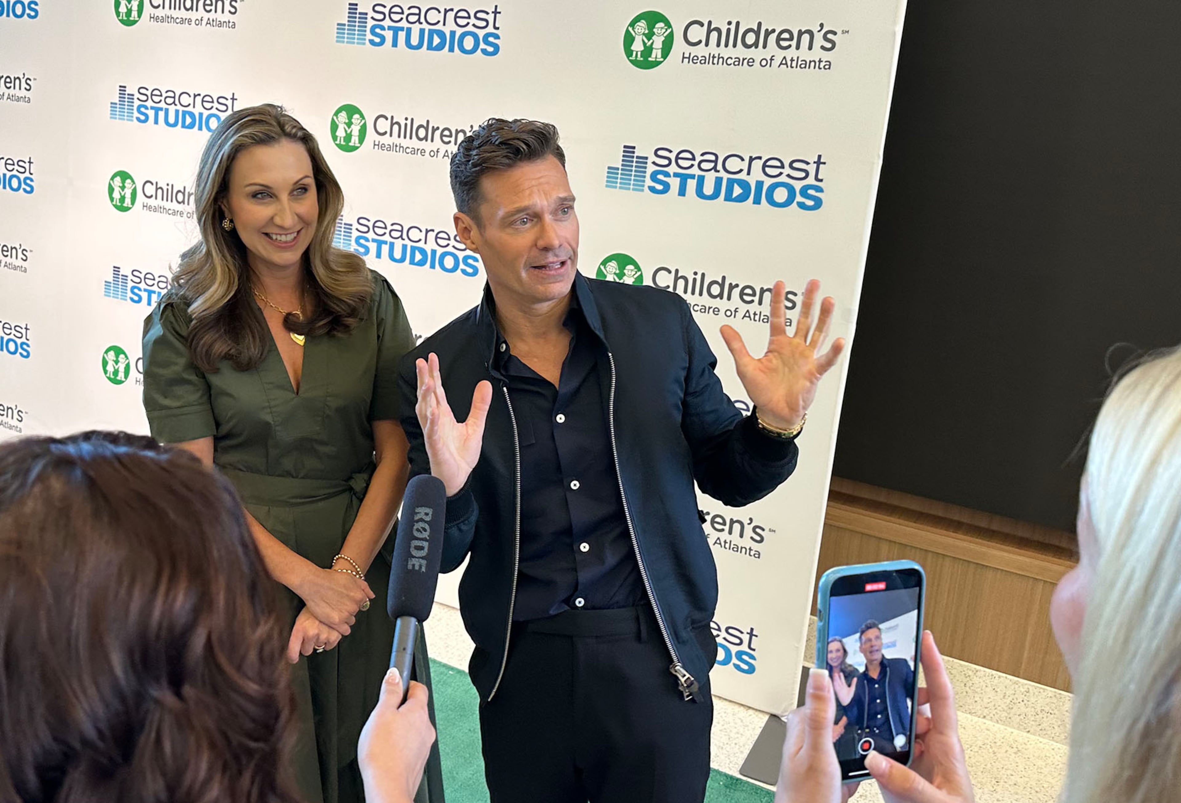 Meredith and Ryan Seacrest at the opening of Seacrest Studios, a special multimedia playground for the patients at Arthur M. Blank hospital for Children's Healthcare of Atlanta on Oct. 11, 2024. RODNEY HO/rho@ajc.com