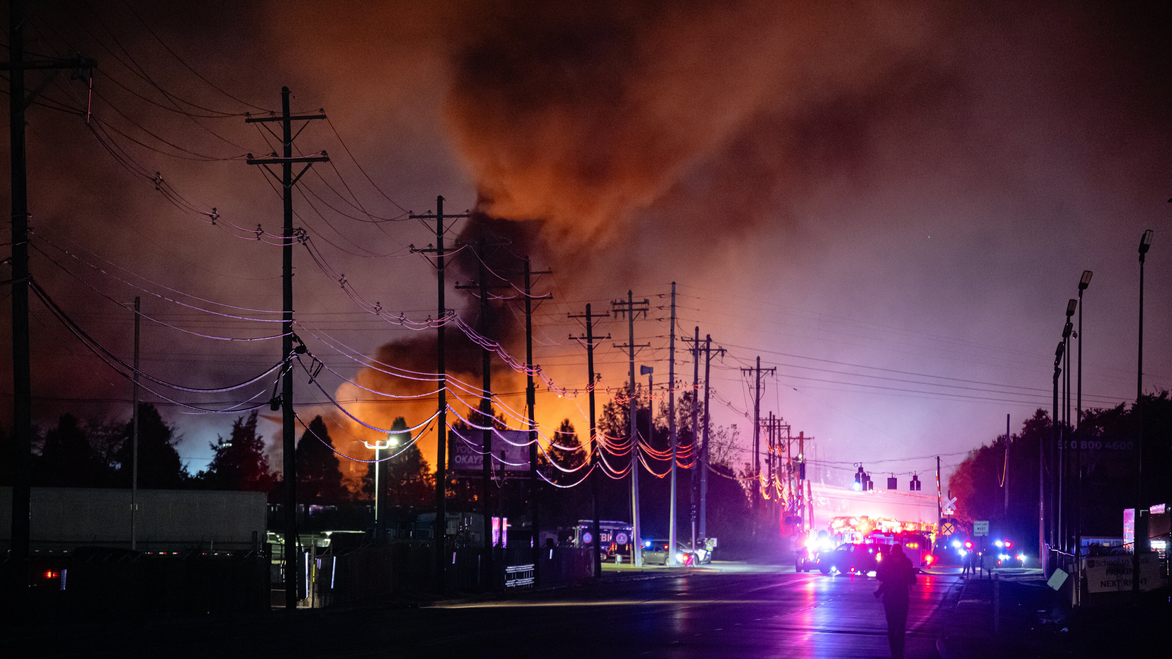 FILE - Plumes of smoke rise from the area of a UPS cargo plane crash at Louisville Muhammad Ali International Airport, on Tuesday, Nov. 4, 2025, in Louisville, Ky. (AP Photo/Jon Cherry, File)