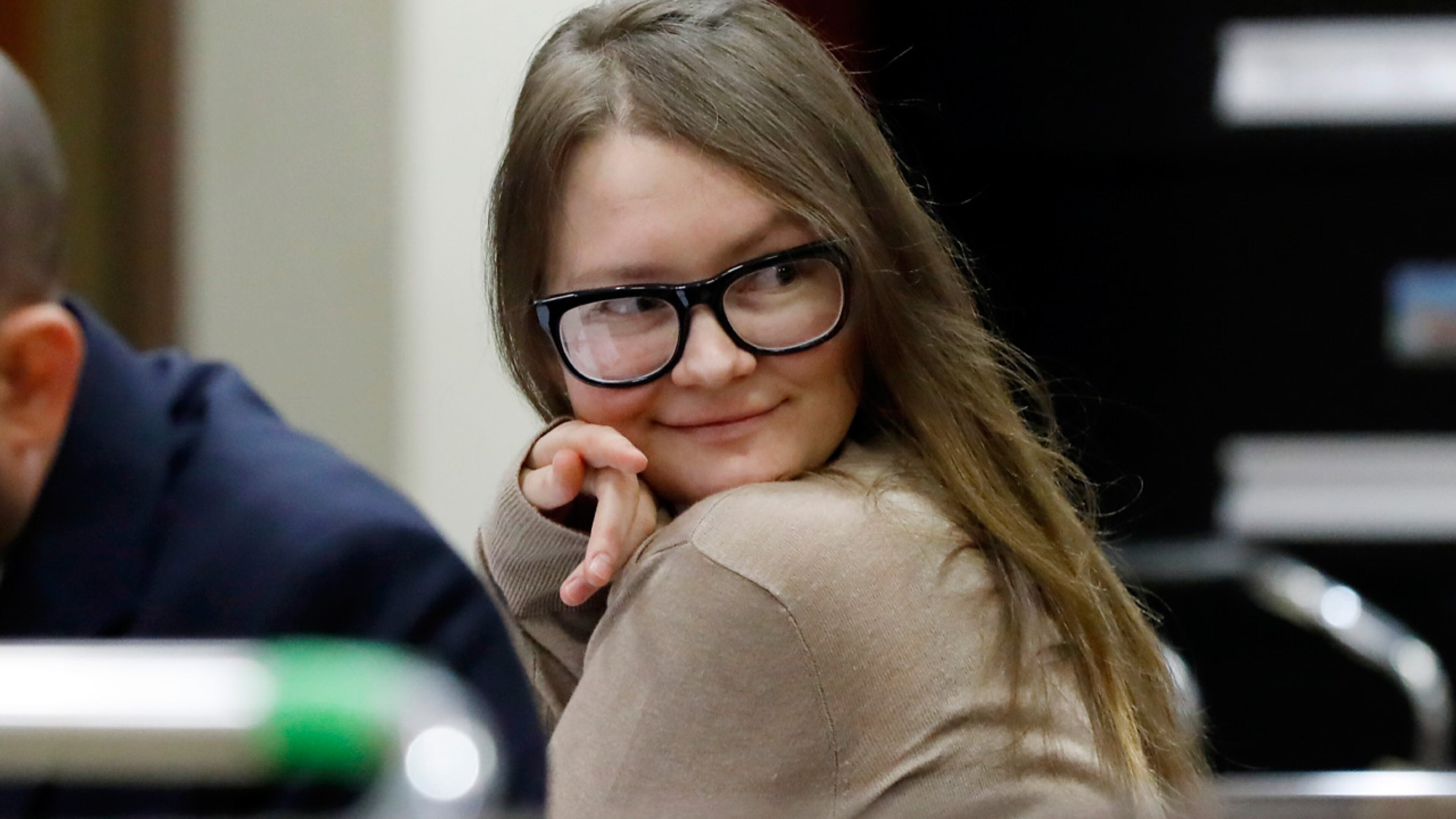 Anna Sorokin sits at the defense table in New York State Supreme Court, in New York, Wednesday, March 27, 2019. Sorokin, who claimed to be a German heiress, is on trial on grand larceny and theft of services charges.