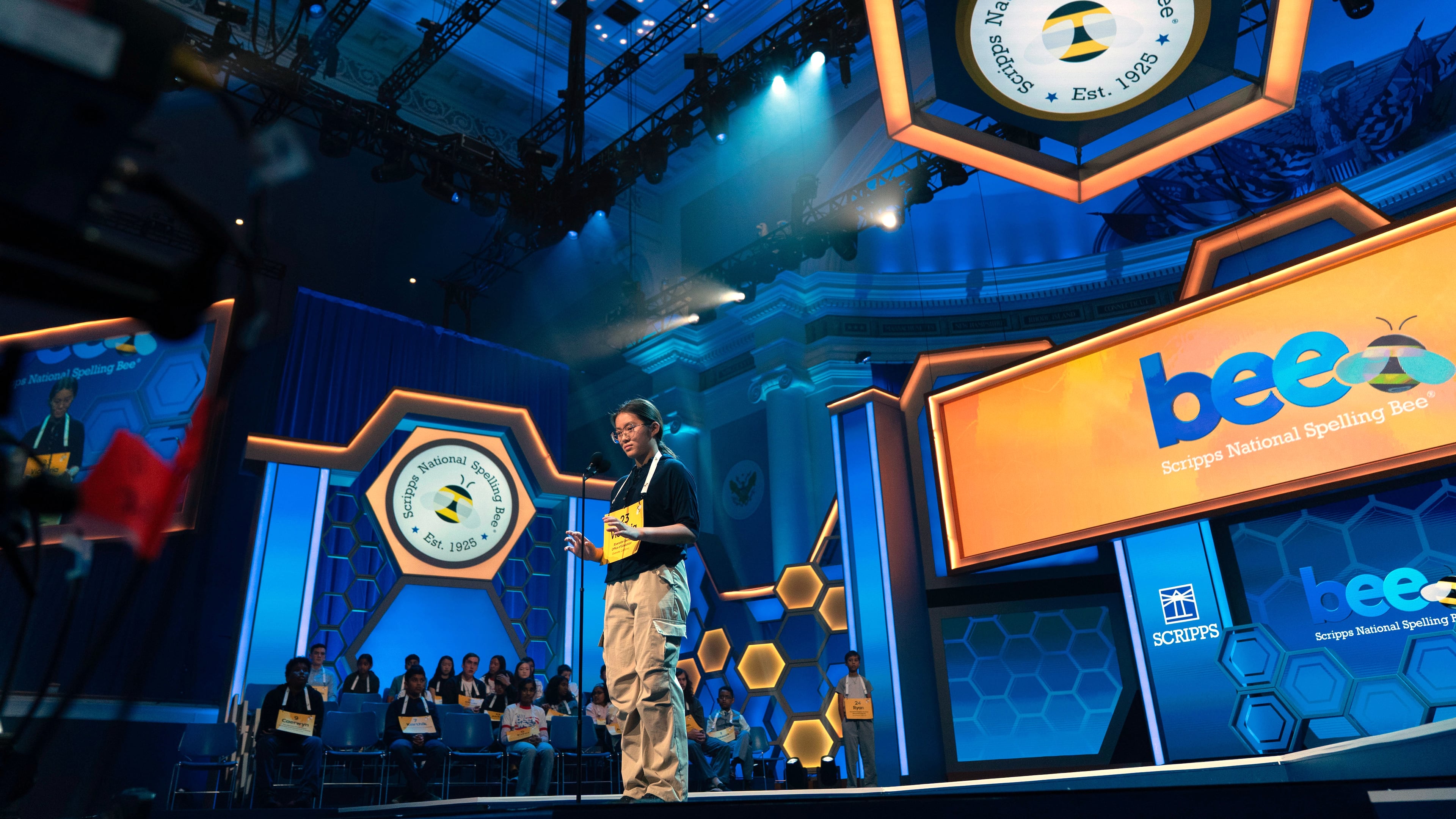 Victoria Li, 12, of Eastvale, Calif., spells his word during the preliminary round of the Scripps National Spelling Bee at DAR Constitution Hall, Tuesday, May 26, 2026, in Washington. (AP Photo/Jose Luis Magana)
