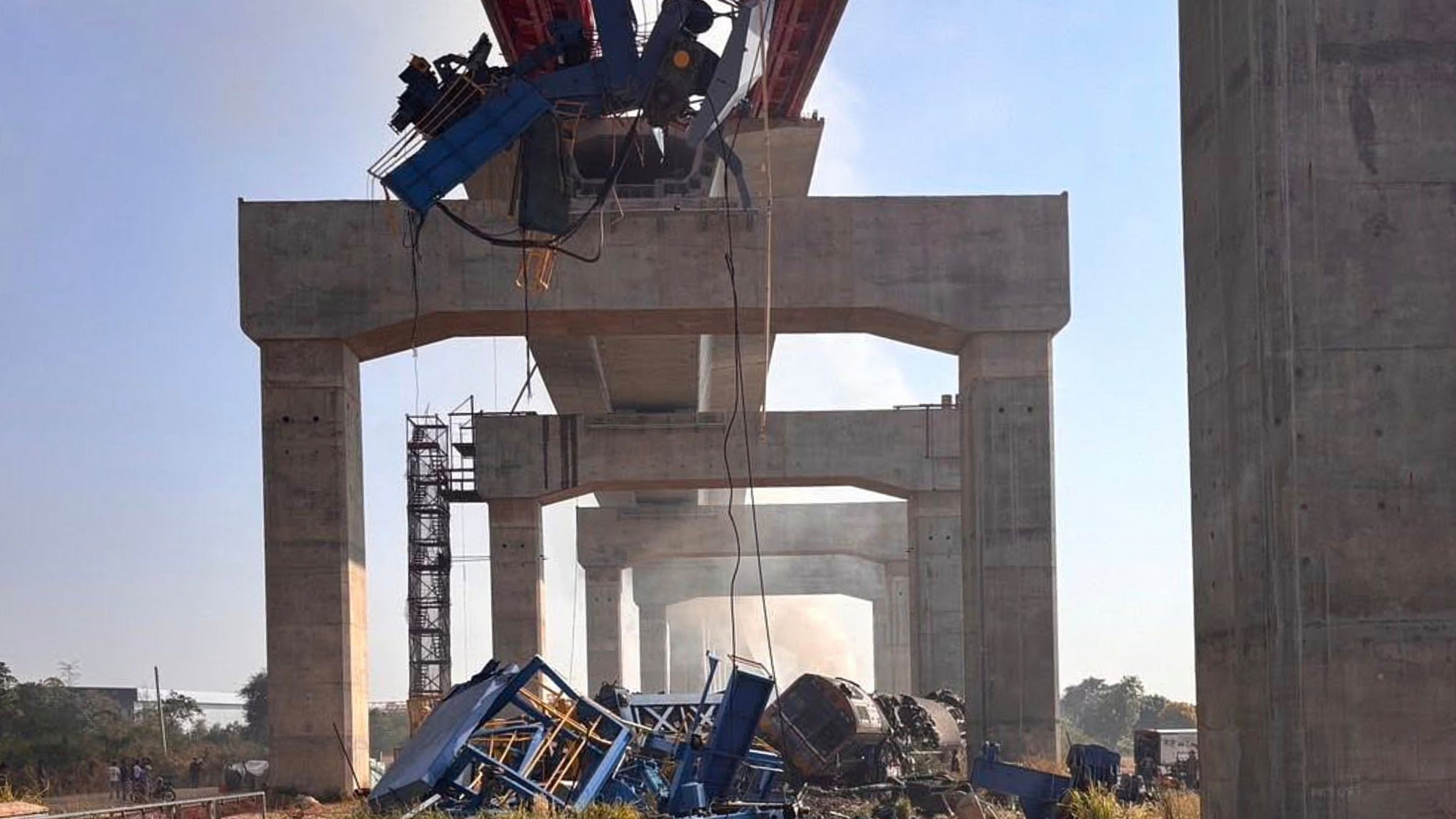 This photo released from State Railway of Thailand, shows a scene after a construction crane fell into a passenger train in Nakhon Ratchasima province, Thailand Wednesday, Jan. 14, 2026. (State Railway of Thailand via AP)
