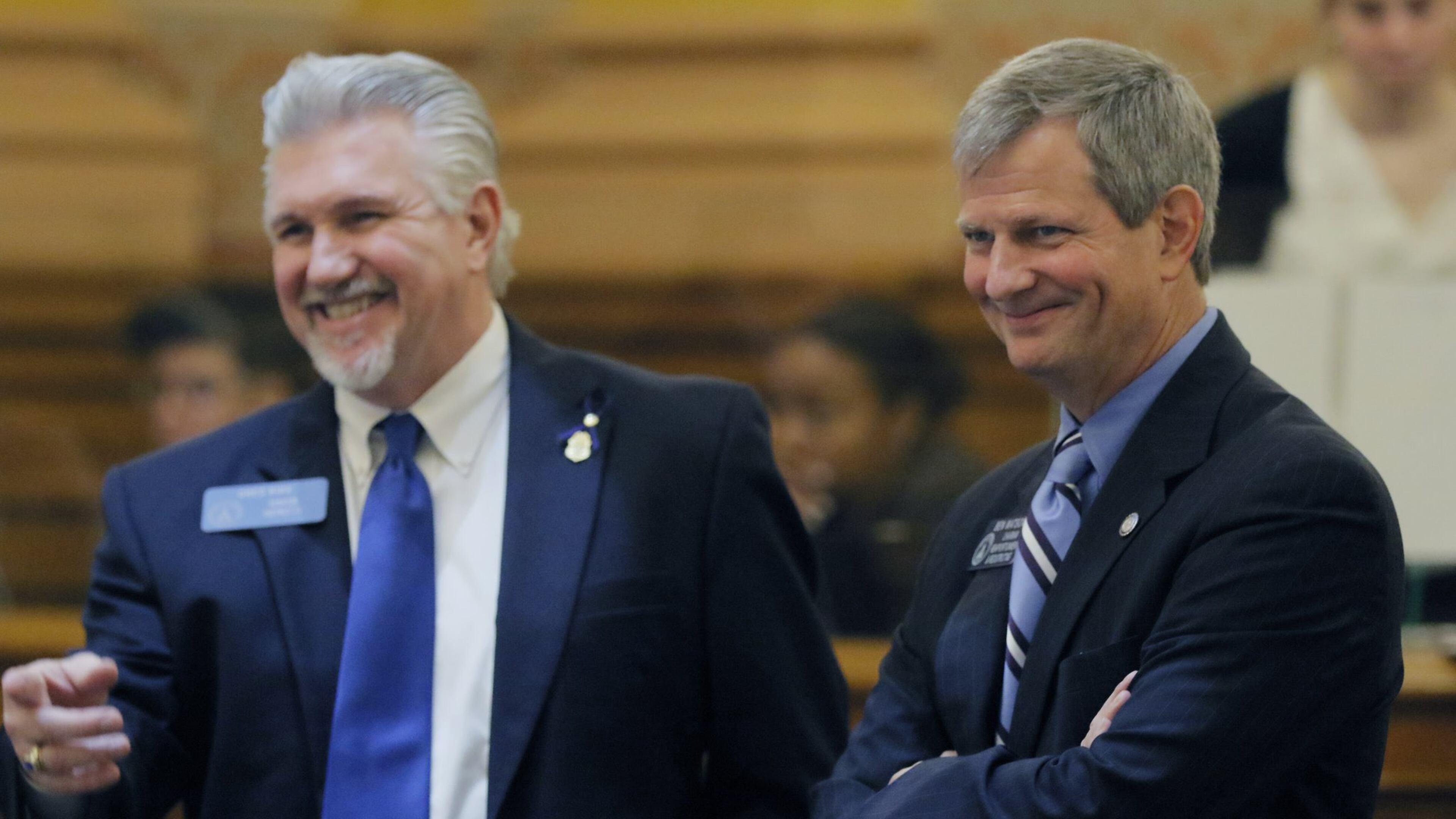 Feb. 24 2017 - Atlanta - Sen. Ben Watson (right) confers with Senator Greg Kirk in the Senate. The coastal Georgia senator whose medical company could benefit from opening an outpatient surgery center has introduced a bill that would allow him to do just that. The state’s nonprofit and rural hospitals protest that relaxing the law to allow such private surgeries could suck away one of their last profitable services. Watson said he has backed off the issue for now. The 24th day of the Georgia General Assembly. BOB ANDRES /BANDRES@AJC.COM