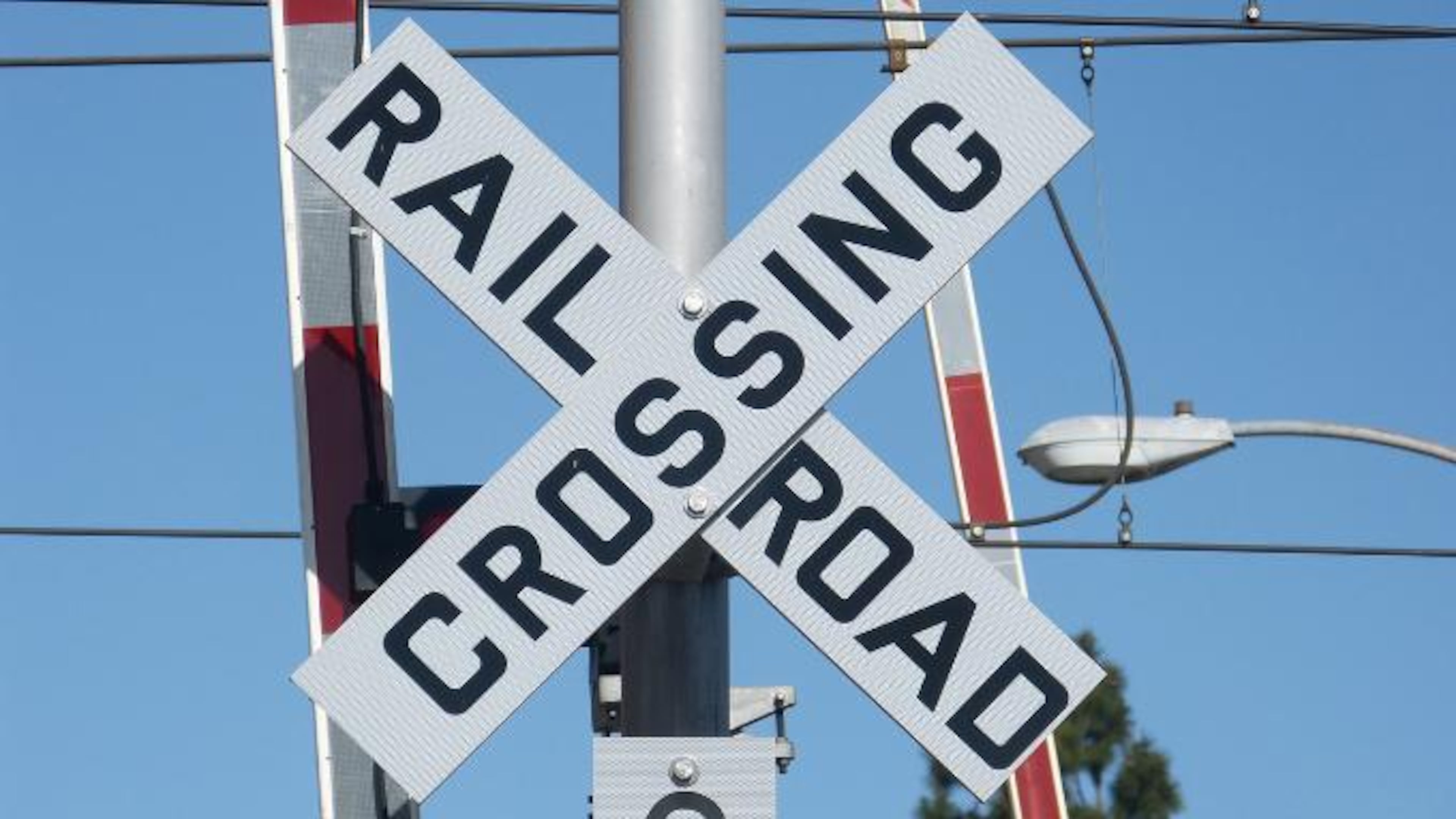 An Austell man was killed Monday morning while crossing a railroad track in a motorized wheelchair, police said.