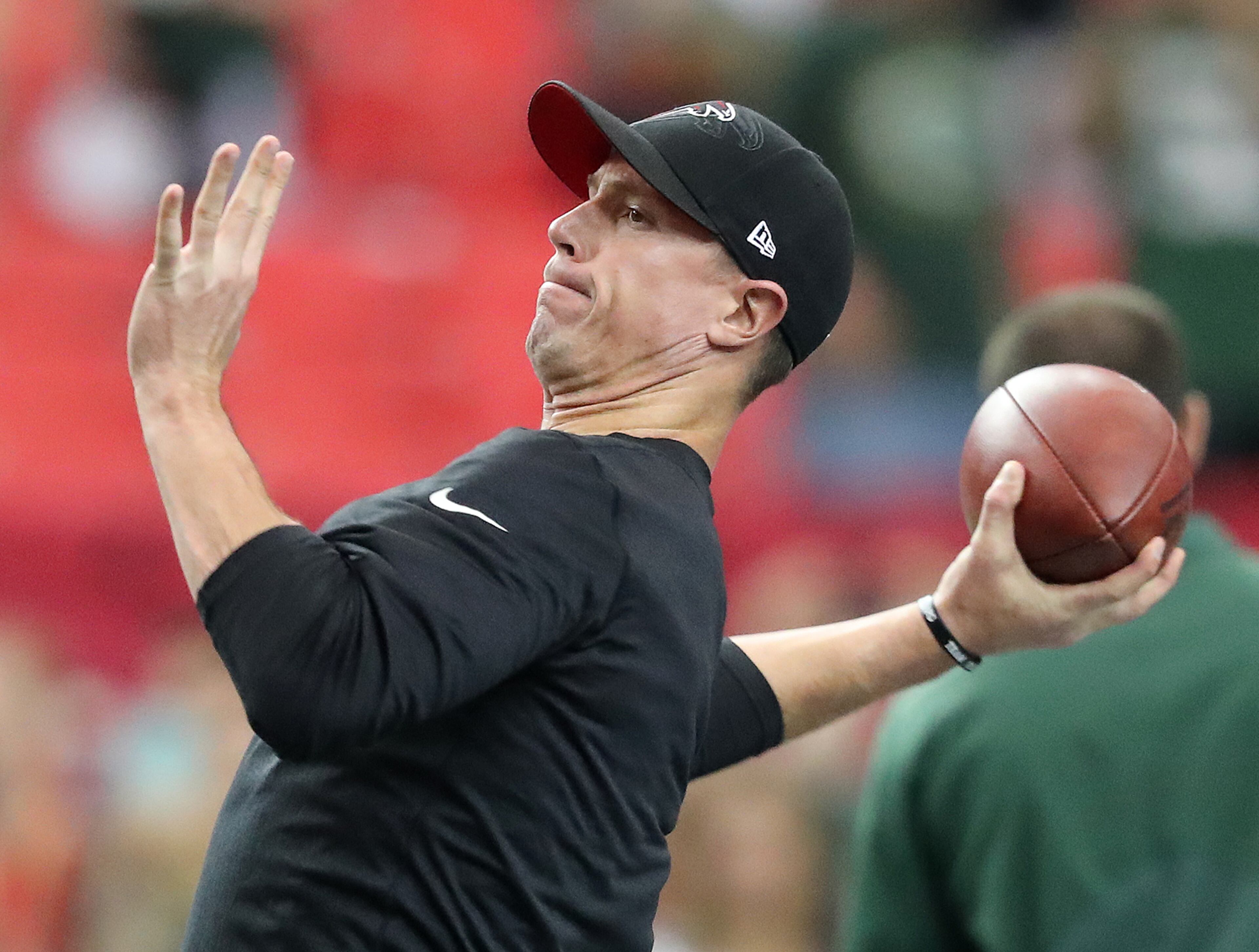 Matt Ryan throws a long pass to Julio Jones as they prepare to play the Packers in an NFL football game on Sunday, Oct. 30, 2016, in Atlanta. Curtis Compton /ccompton@ajc.com