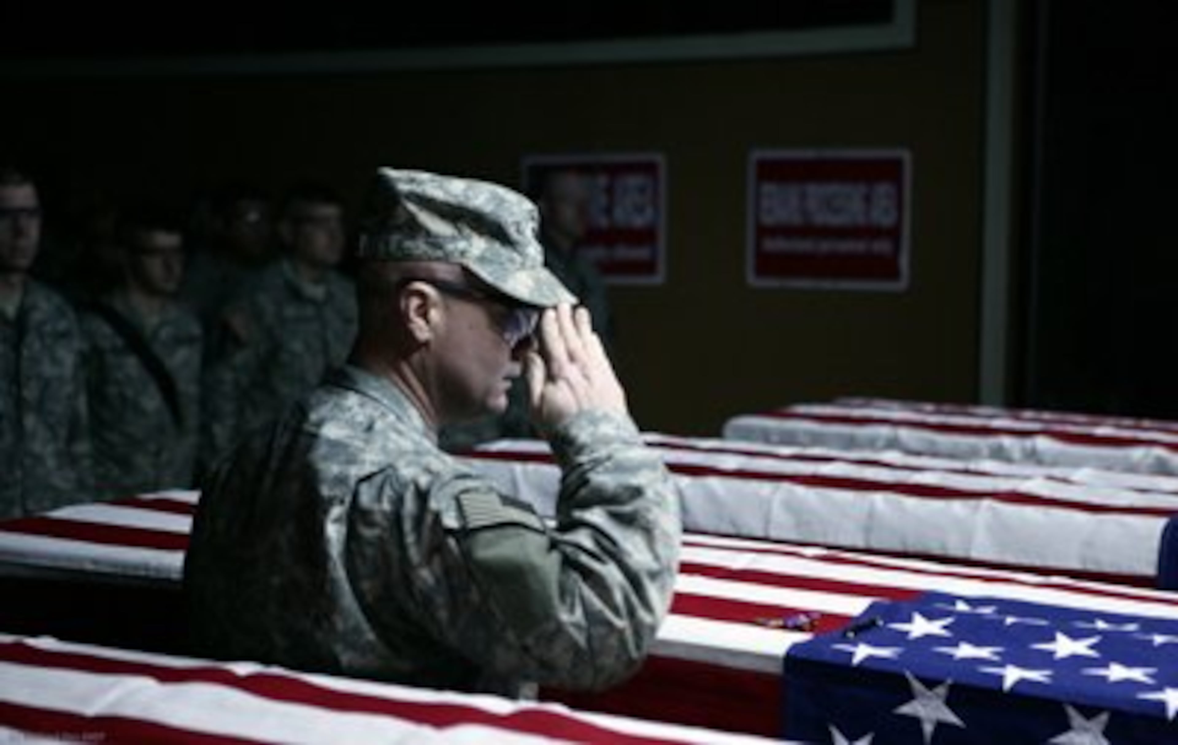 Welsh salutes the fallen. He commanded a battalion that lost 28 soldiers during 2006 and 2007 in Mosul, Iraq. When Welsh talks about Mosul, his is there again--in the heat, and the dust and the dirt. Welsh cannot talk without waging a smaller war with his emotions. Photo courtesy of Eric Welsh