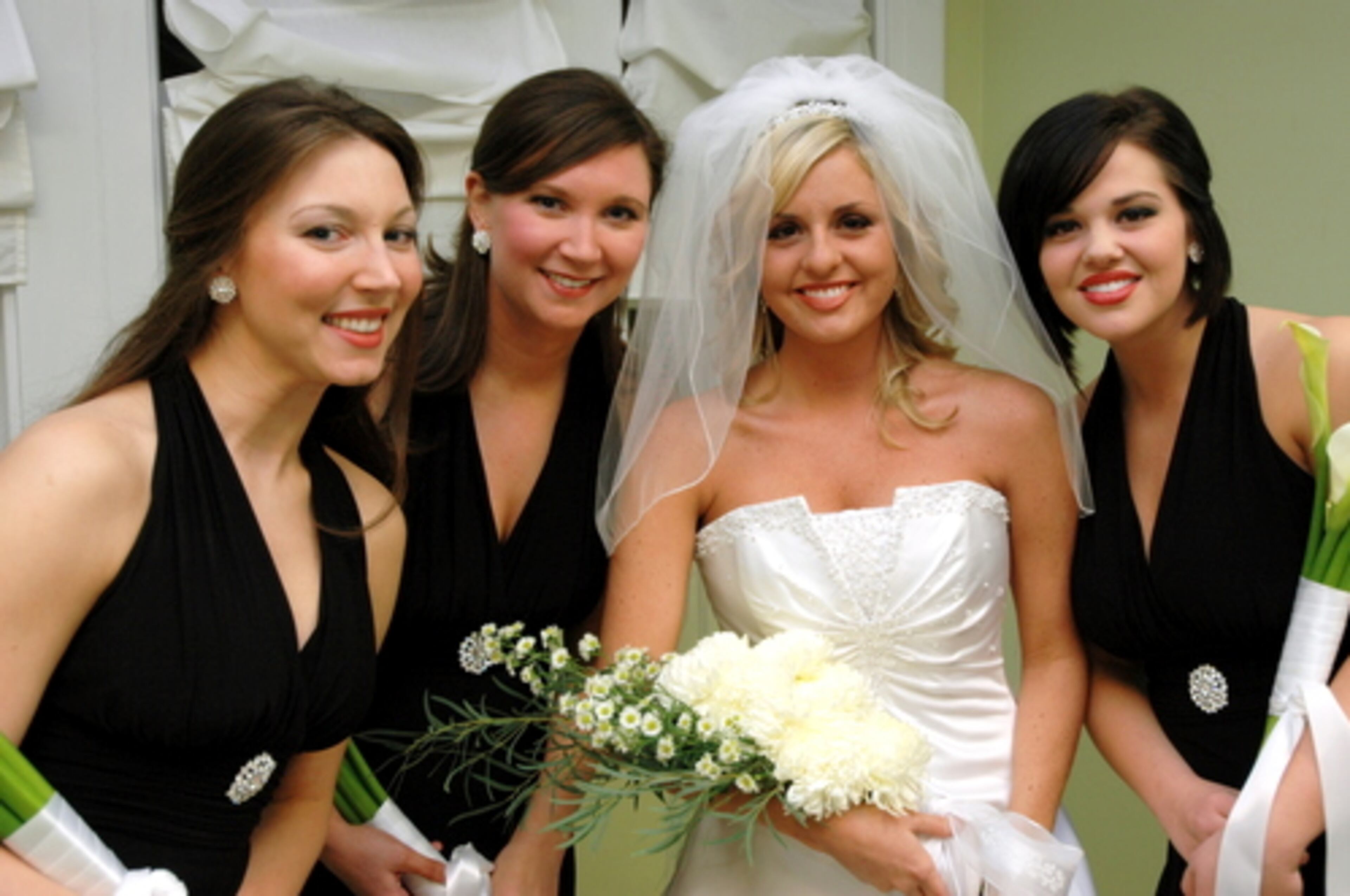 Amanda Adams and her bridesmaids pause for a photo op before her wedding.