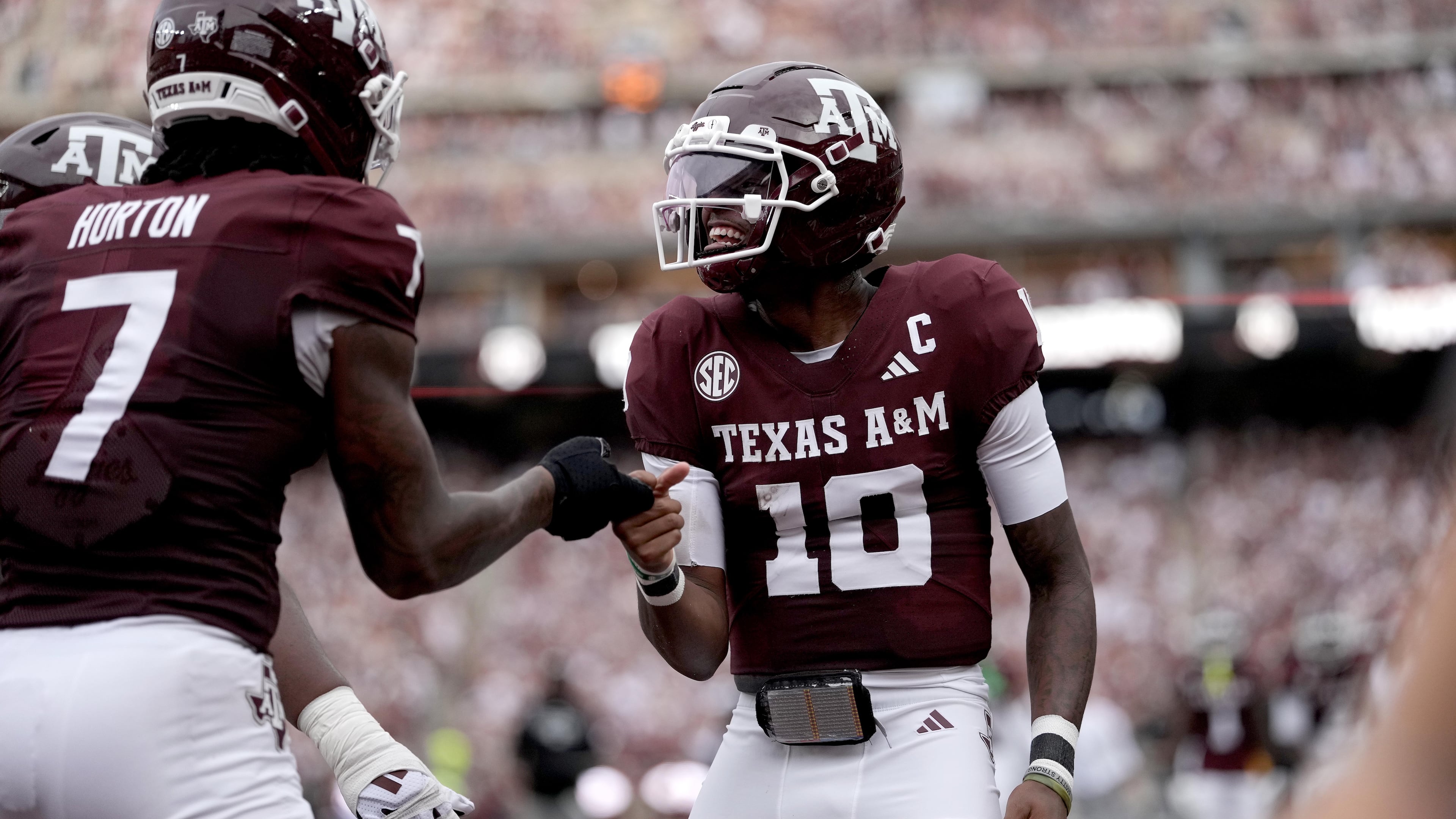 Texas A&M quarterback Marcel Reed (10) reacts with teammate Isaiah Horton (7) after a touchdown against Missouri State during the first quarter of an NCAA college football game Saturday, Sept. 5, 2026, in College Station, Texas. (AP Photo/Sam Craft)