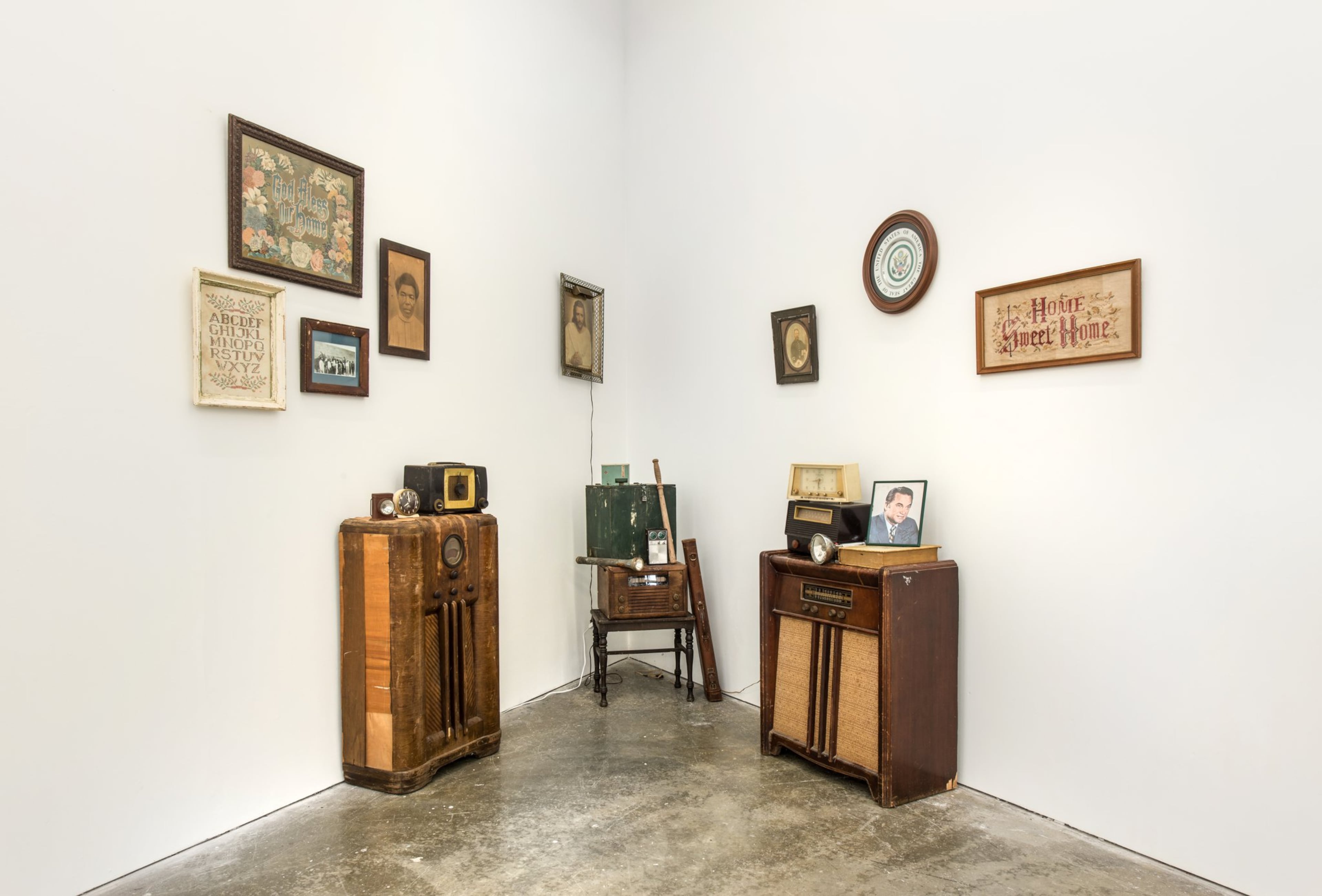 Lonnie Holley’s “The First Time We Heard the King” (2015-17), featuring old radios, clocks, turntable, old voting box, billy club, flashlights, gun case. CONTRIBUTED BY FREDRIK BRAUER