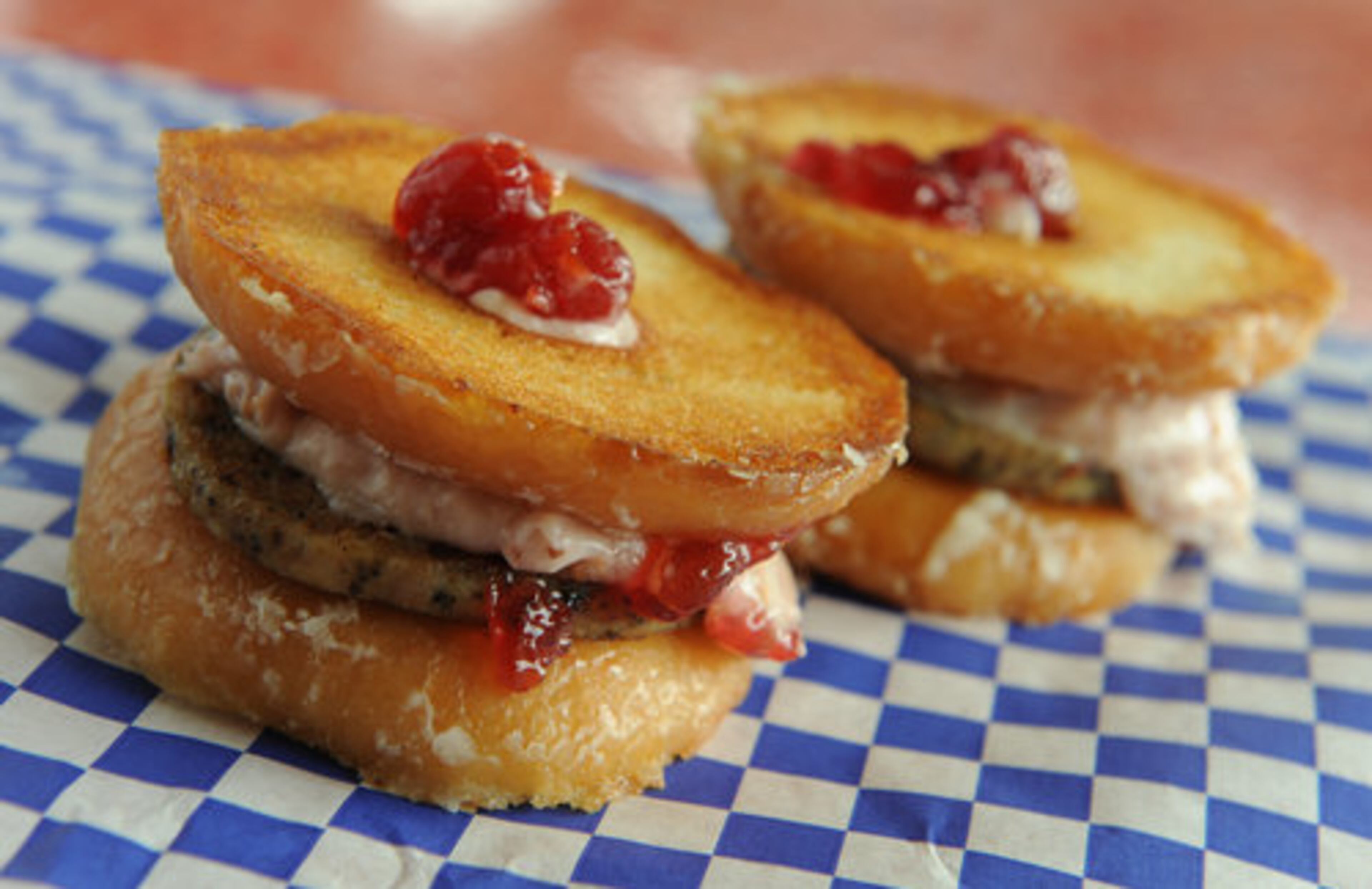 The The Double D Slider -- Chicken sausage patties, grilled Krispy Kreme donuts and cherry cream cheese at Delia's Chicken Sausage Stand in Atlanta. Jon Watson writes, "Those who don't enjoy the herb-heavy flavors of the sausage will find their options are scarce. But if you want something a little different, and a little healthy, Delia's is worth stopping by." Two stars.