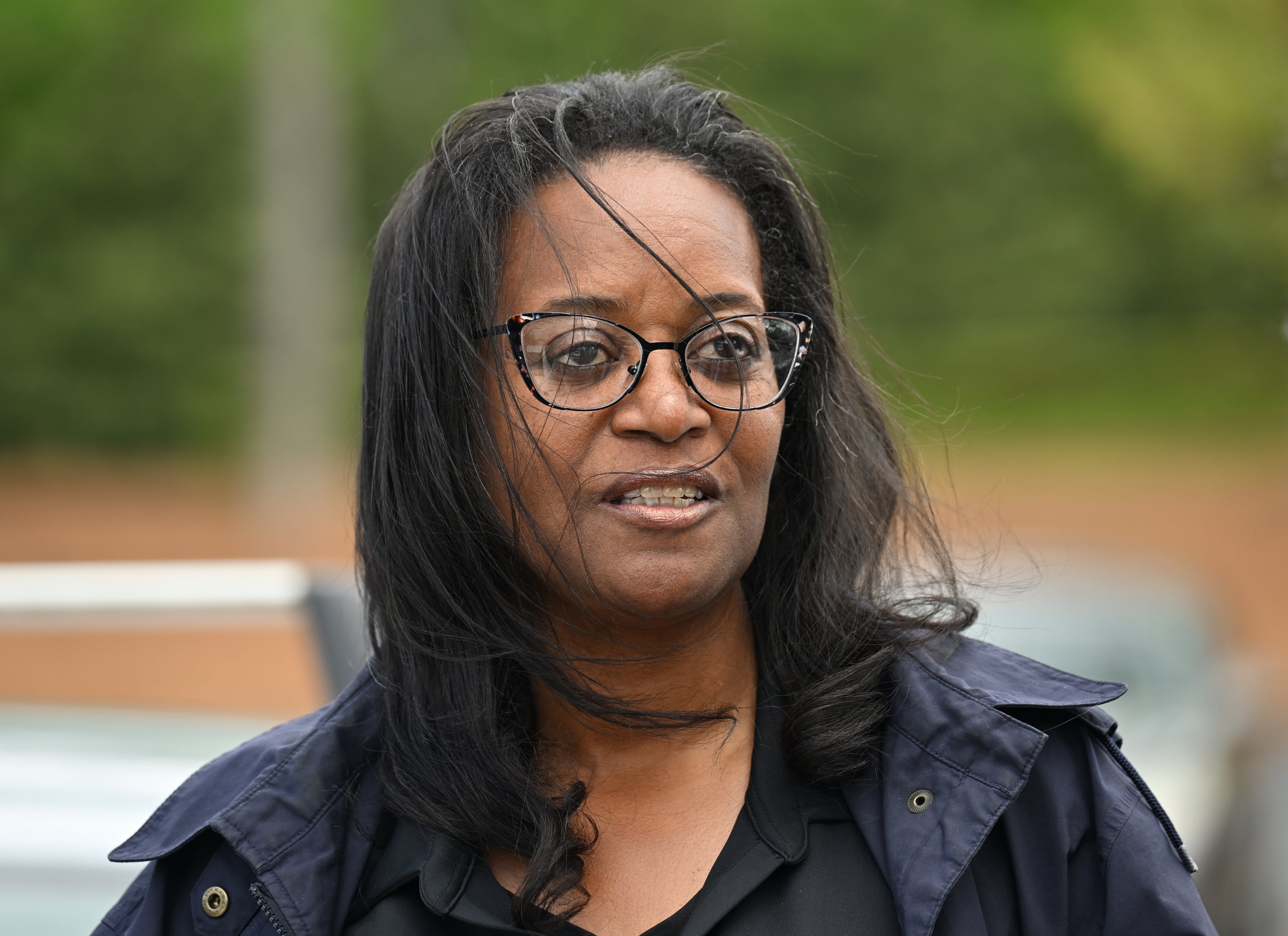 Marva Gillis talks about pastor Charles Stanley outside First Baptist Atlanta where he led for more than 50 years on Saturday, April 22, 2023. (Hyosub Shin / Hyosub.Shin@ajc.com)