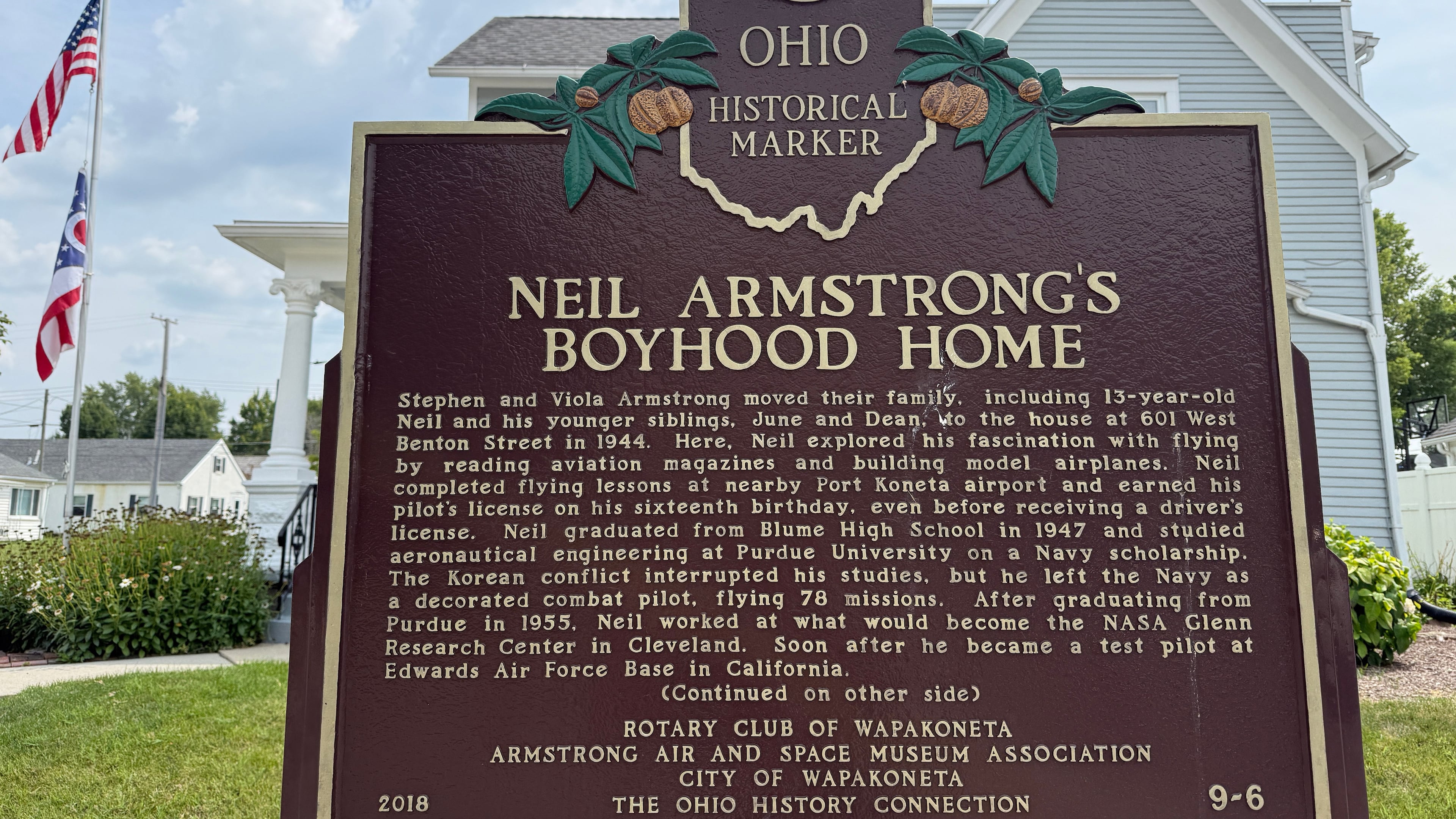 FILE - An Ohio historical landmark sign is displayed outside the former home of Neil Armstrong Friday, July 31, 2026, in Wapakoneta, Ohio. (AP Photo/Patrick Aftoora-Orsagos, file)