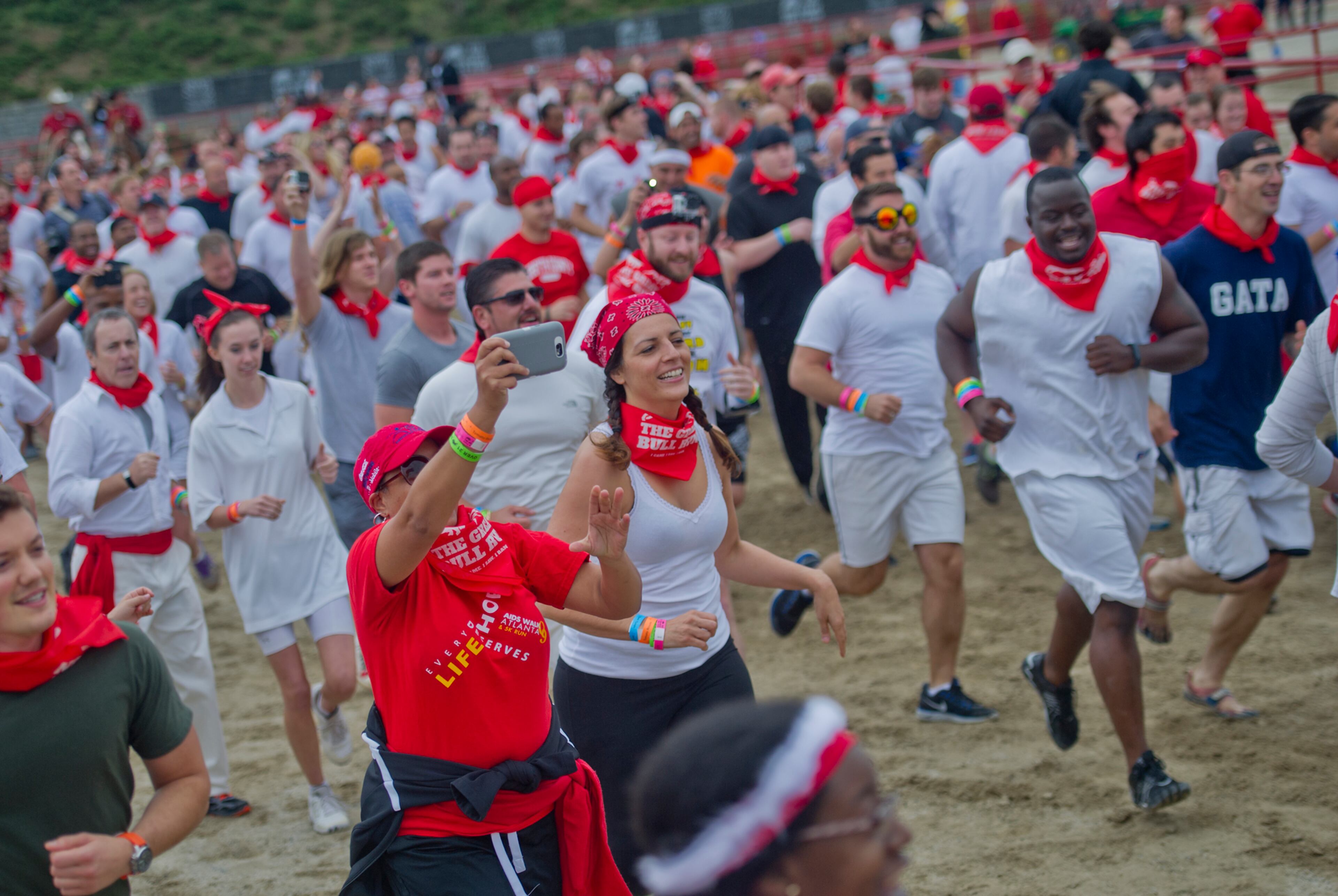Thousands of participants got their chance to run a quarter mile course while being chased by 18, 1,800 pound bulls during the Great Bull Run at the Georgia International Horse Park in Conyers on Saturday, October 19, 2013.