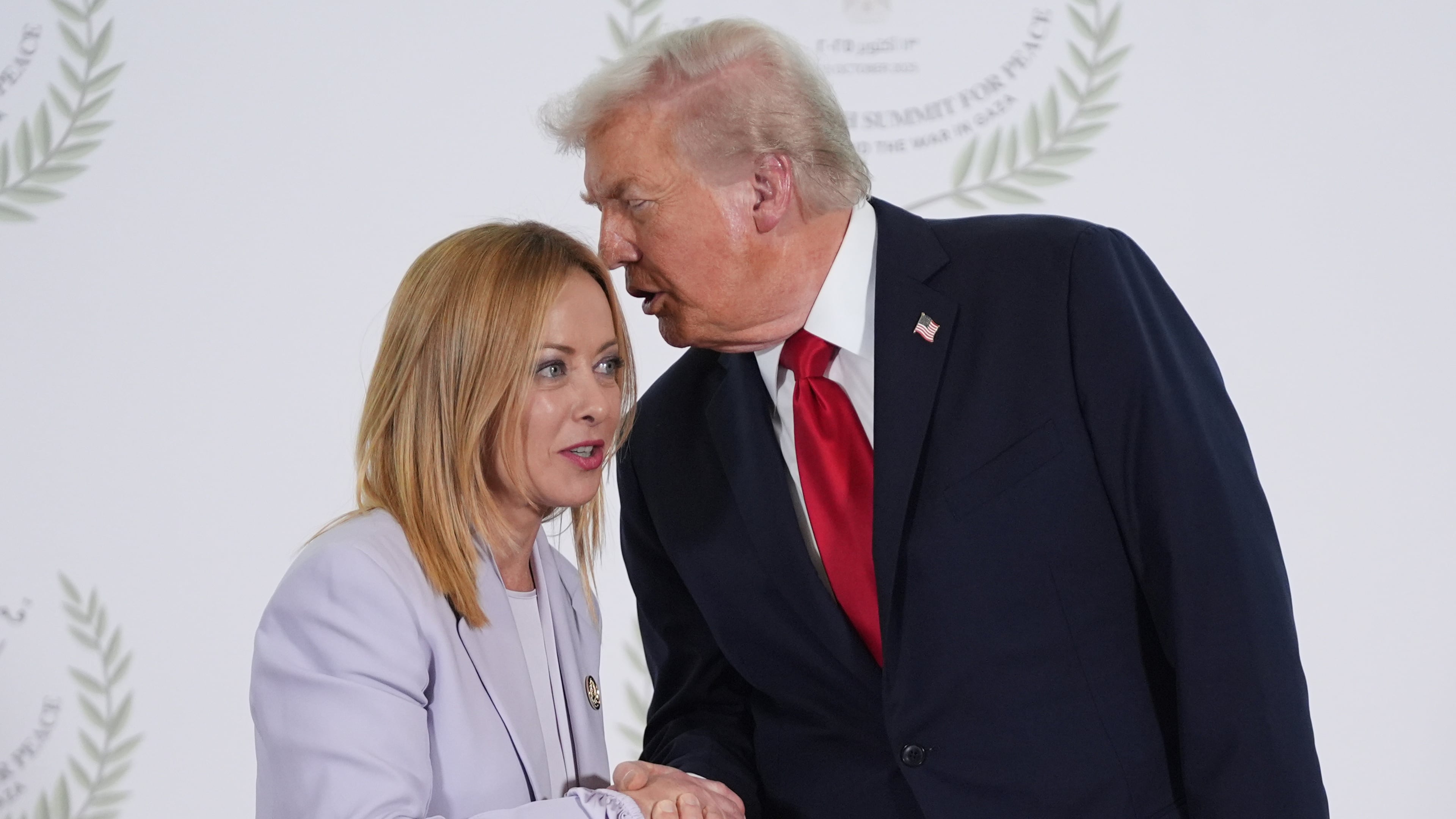 FILE -President Donald Trump greets Italy's Prime Minister Giorgia Meloni during summit to support ending the more than two-year Israel-Hamas war in Gaza after a breakthrough ceasefire deal, Oct. 13, 2025, in Sharm El Sheikh, Egypt. (AP Photo/Evan Vucci, Pool, File)
