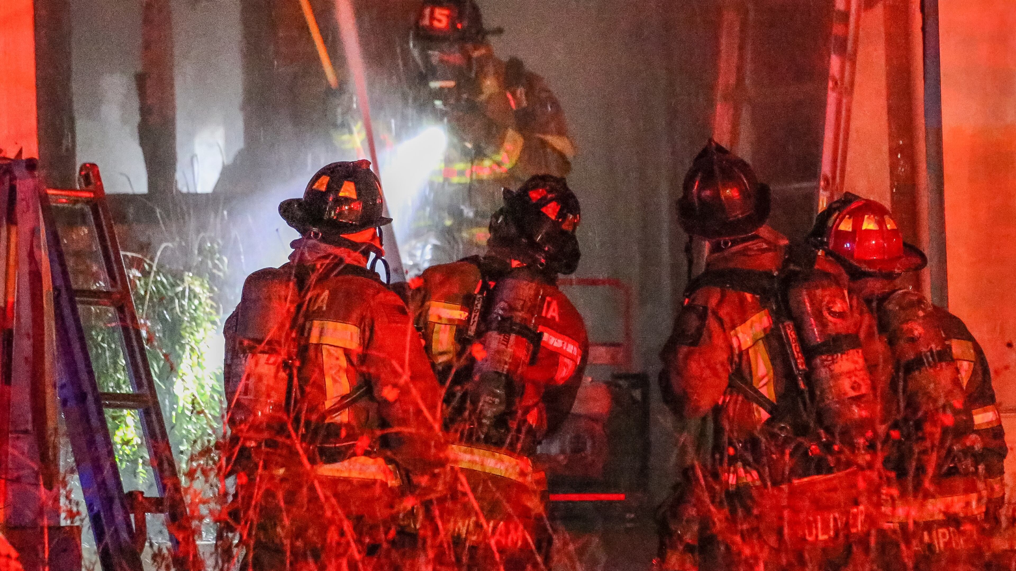 Crews extinguished a blaze that damaged the first floor of a home Friday in northeast Atlanta. JOHN SPINK / JSPINK@AJC.COM