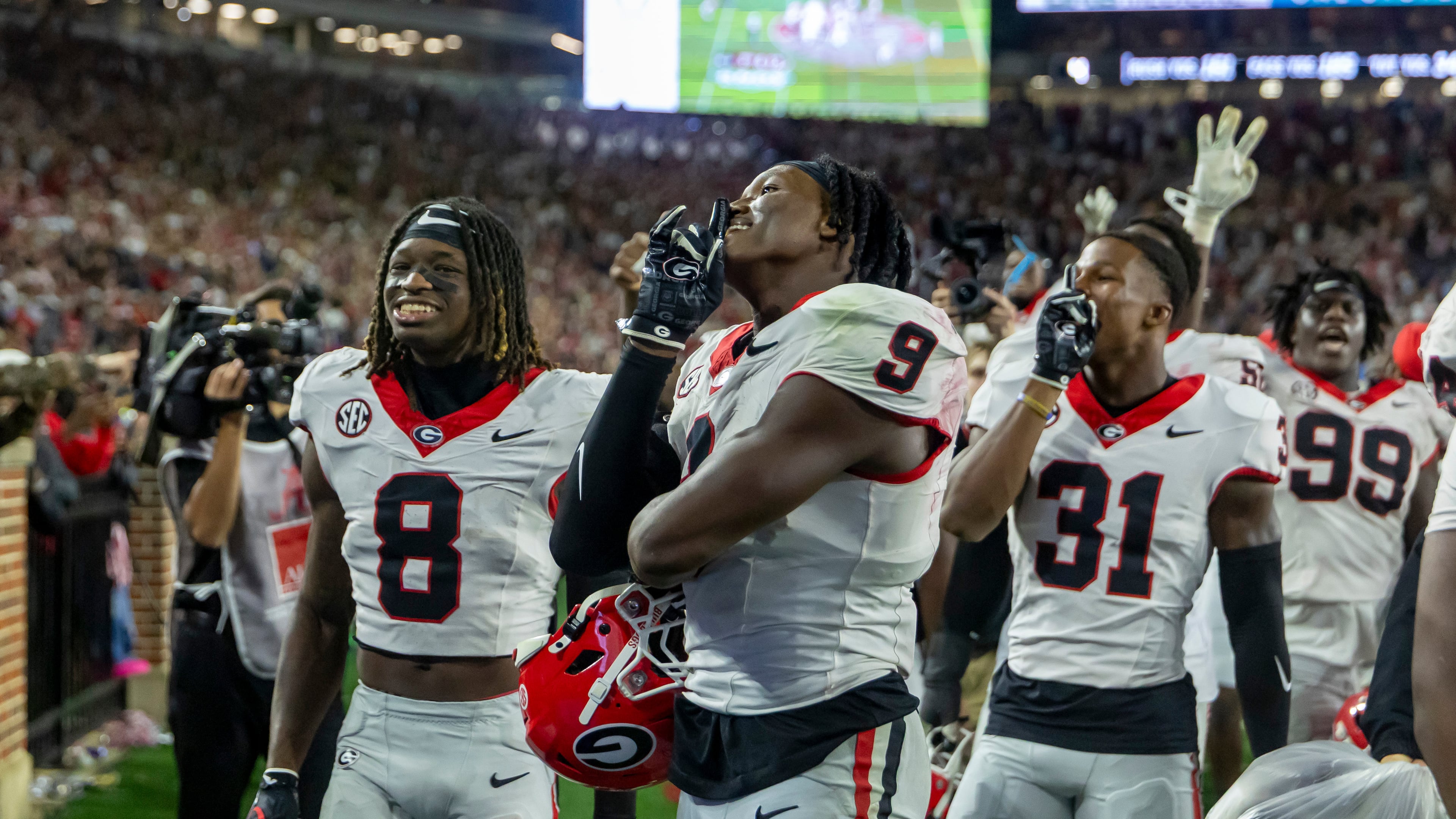 Georgia linebacker Chris Cole (9) celebrates with the Georgia fans as the final seconds wind off the clock in a win over Alabama during the second half of an NCAA college football game Saturday, Oct. 10, 2026, in Tuscaloosa, Ala. (AP Photo/Vasha Hunt)