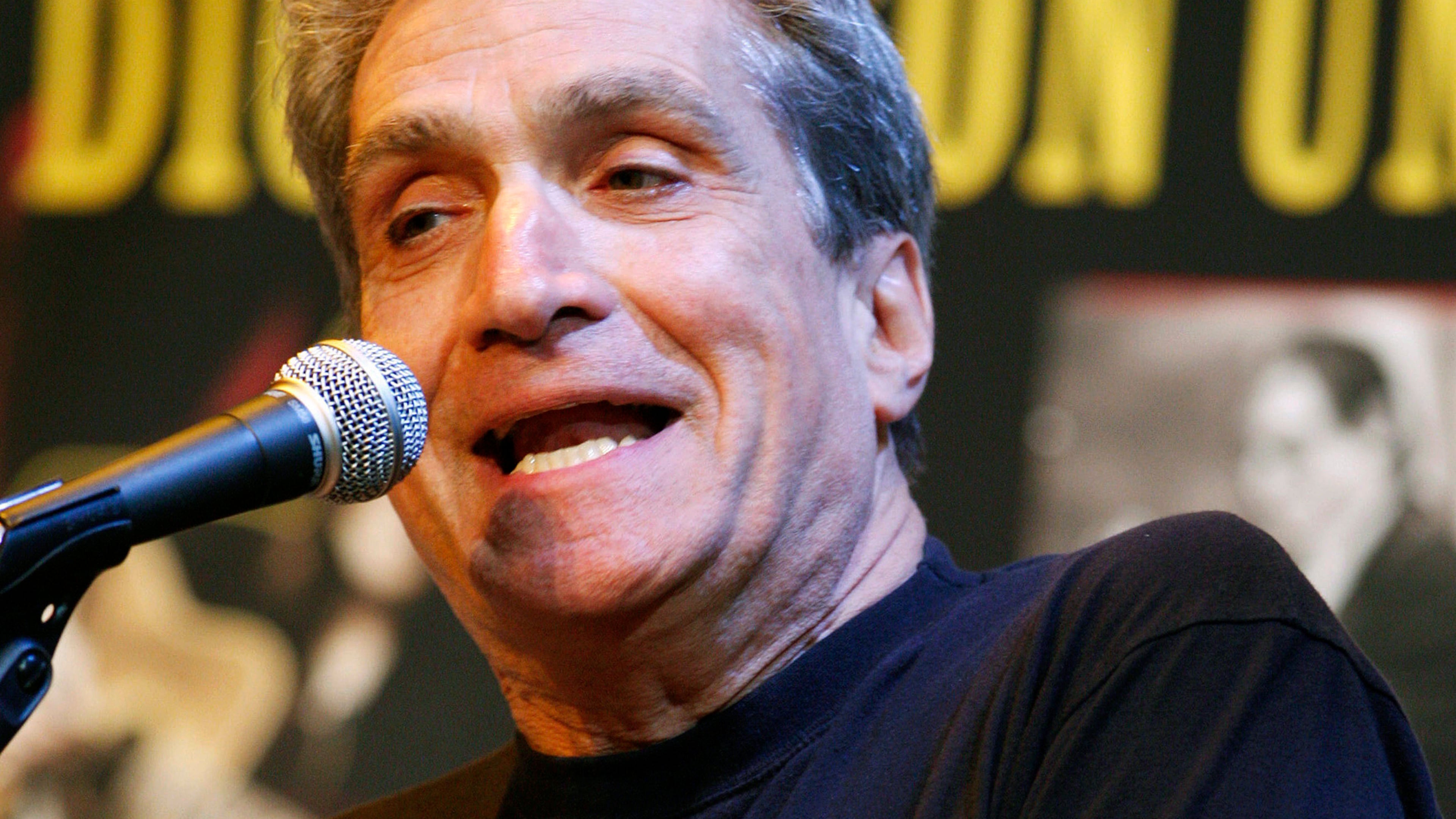 FILE - Former U.S. poet laureate Robert Pinsky recites one of his poems on stage at Fairleigh Dickinson University in Madison, N.J., on May 6, 2010. (AP Photo/Mel Evans, File)