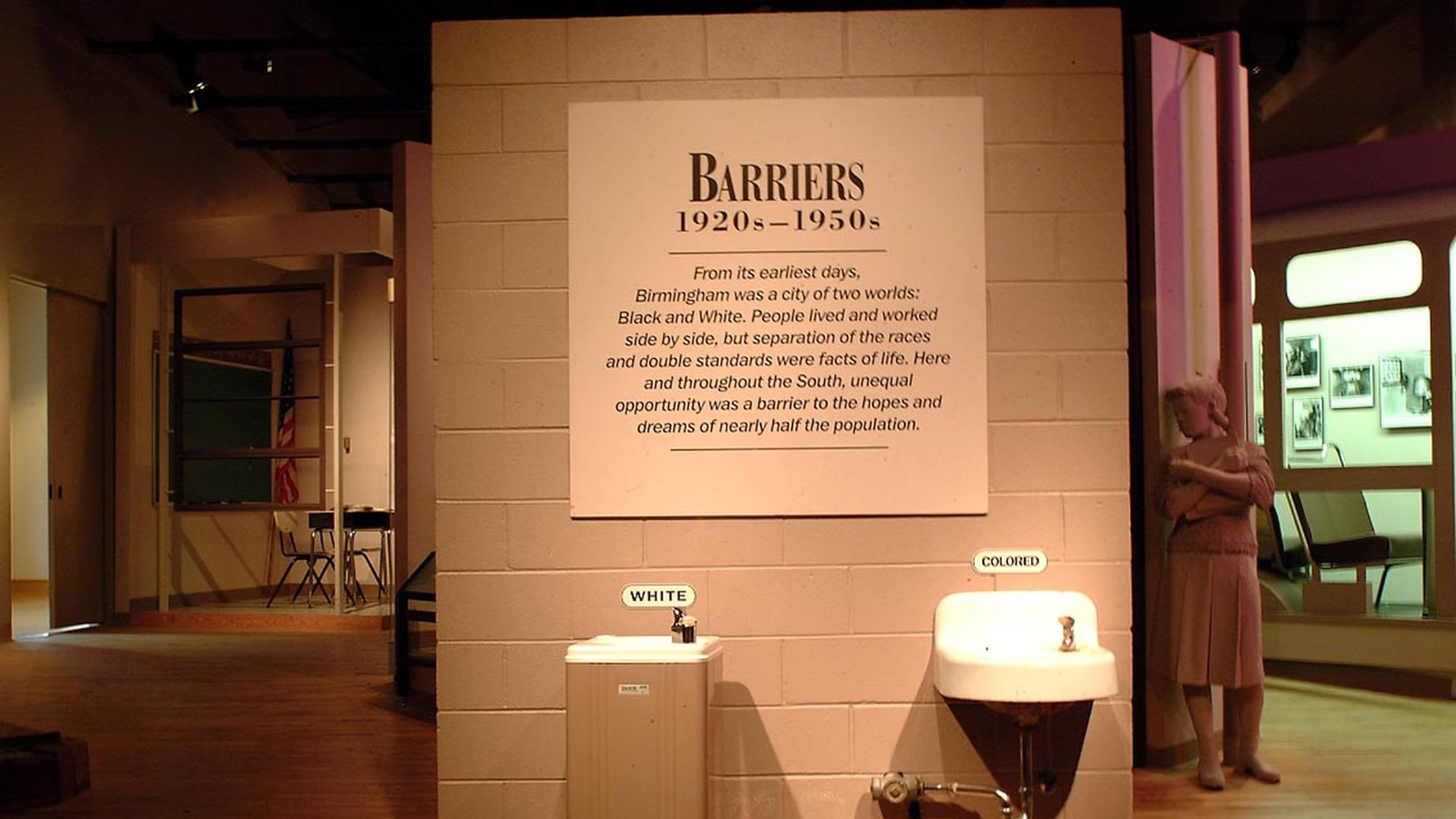 An exhibit at the Birmingham Civil Rights Institute in Birmingham, Ala., shows the color line established by Birmingham’s Jim Crow laws. Separate water fountains were designated for whites and blacks.