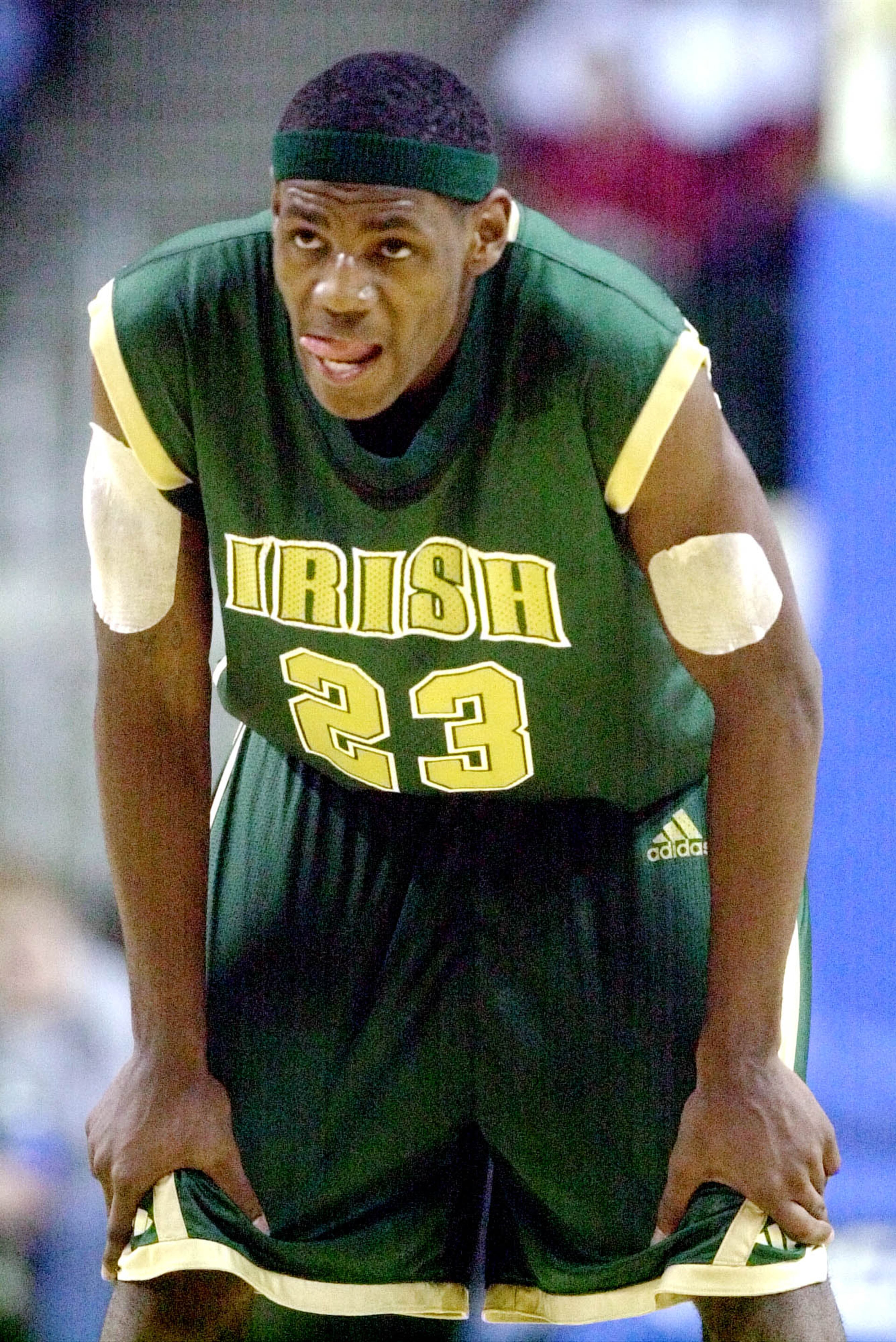 St. Vincent-St. Mary's LeBron James keeps a close eye on his opponent Sunday, January 13, 2002 at the Cleveland Convocation Center in Cleveland.
