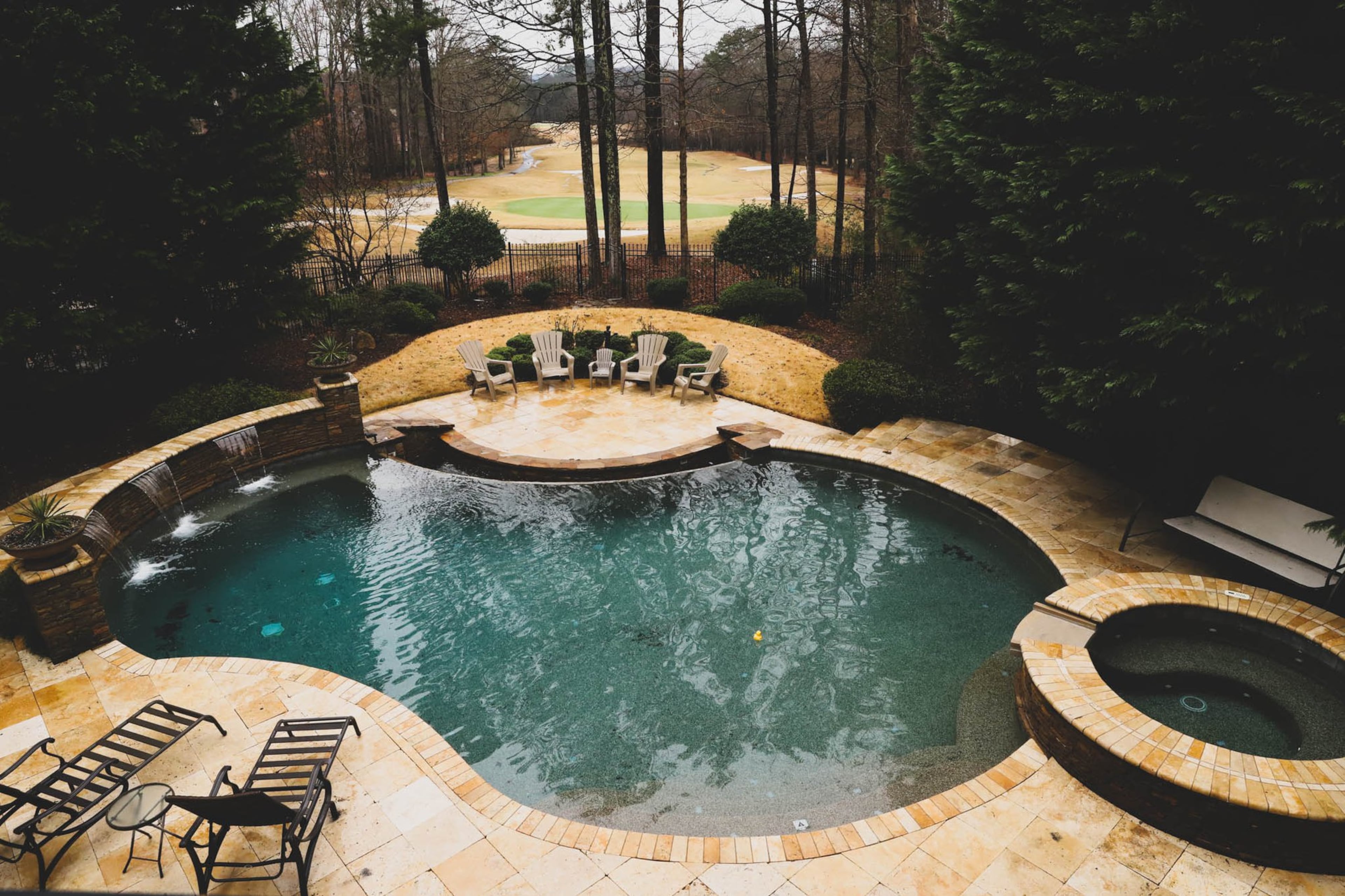 When Jean-Francois and Martha Morizur moved to Cumming, they knew they wanted a home as similar as possible to the house they loved in Indiana. Though local home styles were different than the ones they were familiar with, they found a space that works for them. The space is great for gatherings and parties, and the family uses the hot tub in the cooler months. Text by Shannon Dominy. Photo by Reynolds Rogers.