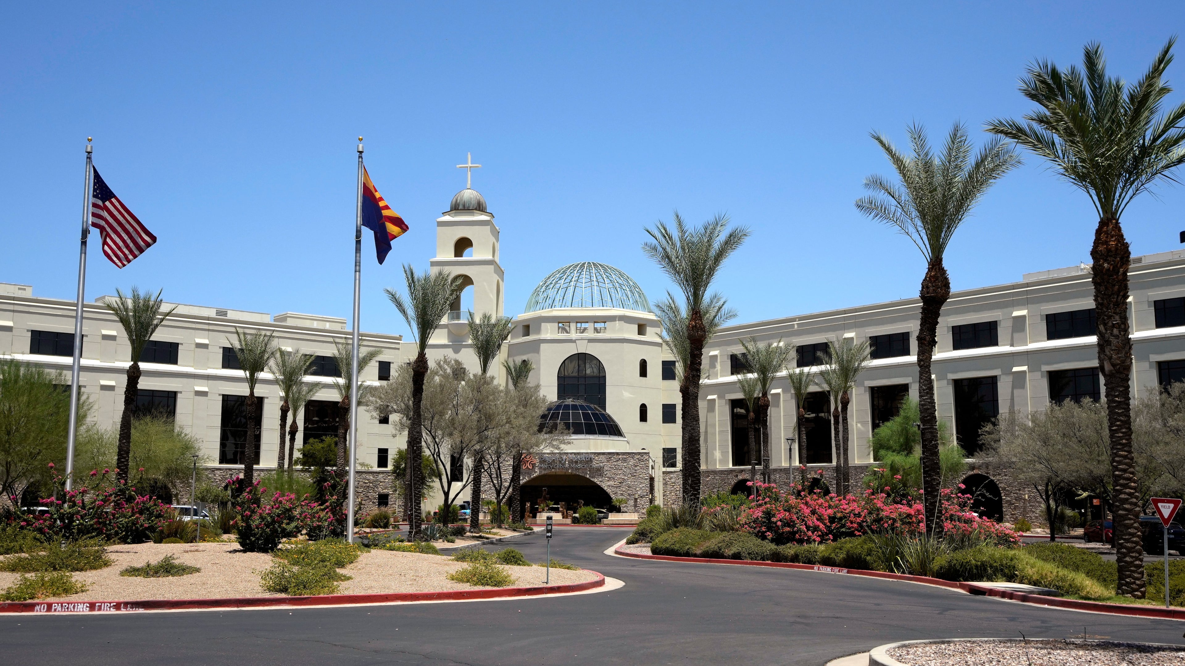 Mercy Gilbert Medical Center, shown here, where an 18-month-old toddler discovered in a backyard pool and taken to the hospital in February, was declared dead before being found breathing hours later in a room that serves as the hospital morgue, according to recently released police records, Monday, July 6, 2026, in Gilbert, Ariz. (AP Photo/Ross D. Franklin)