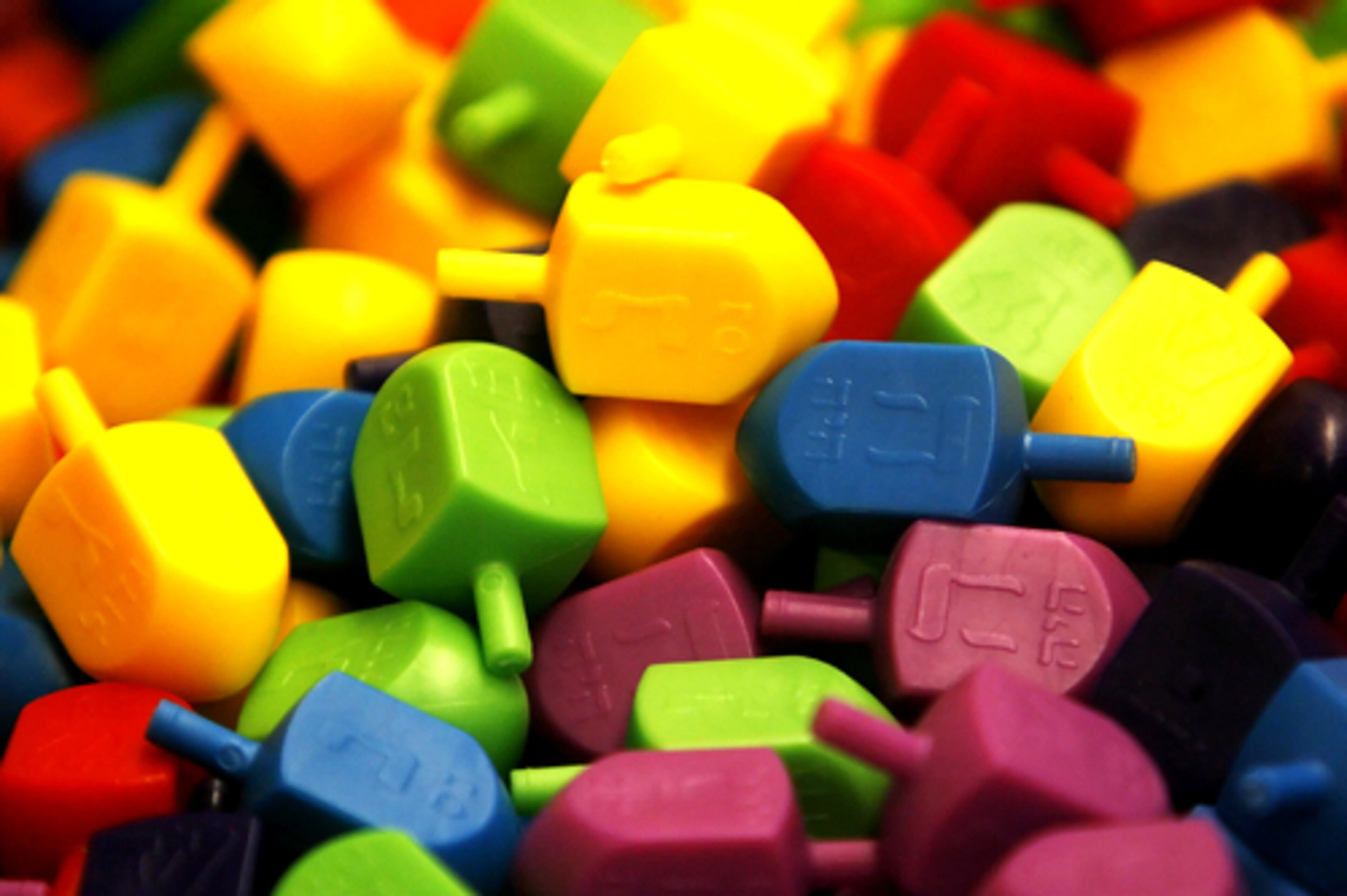 Free dreidel-shaped crayons were among the many free goodies for children.