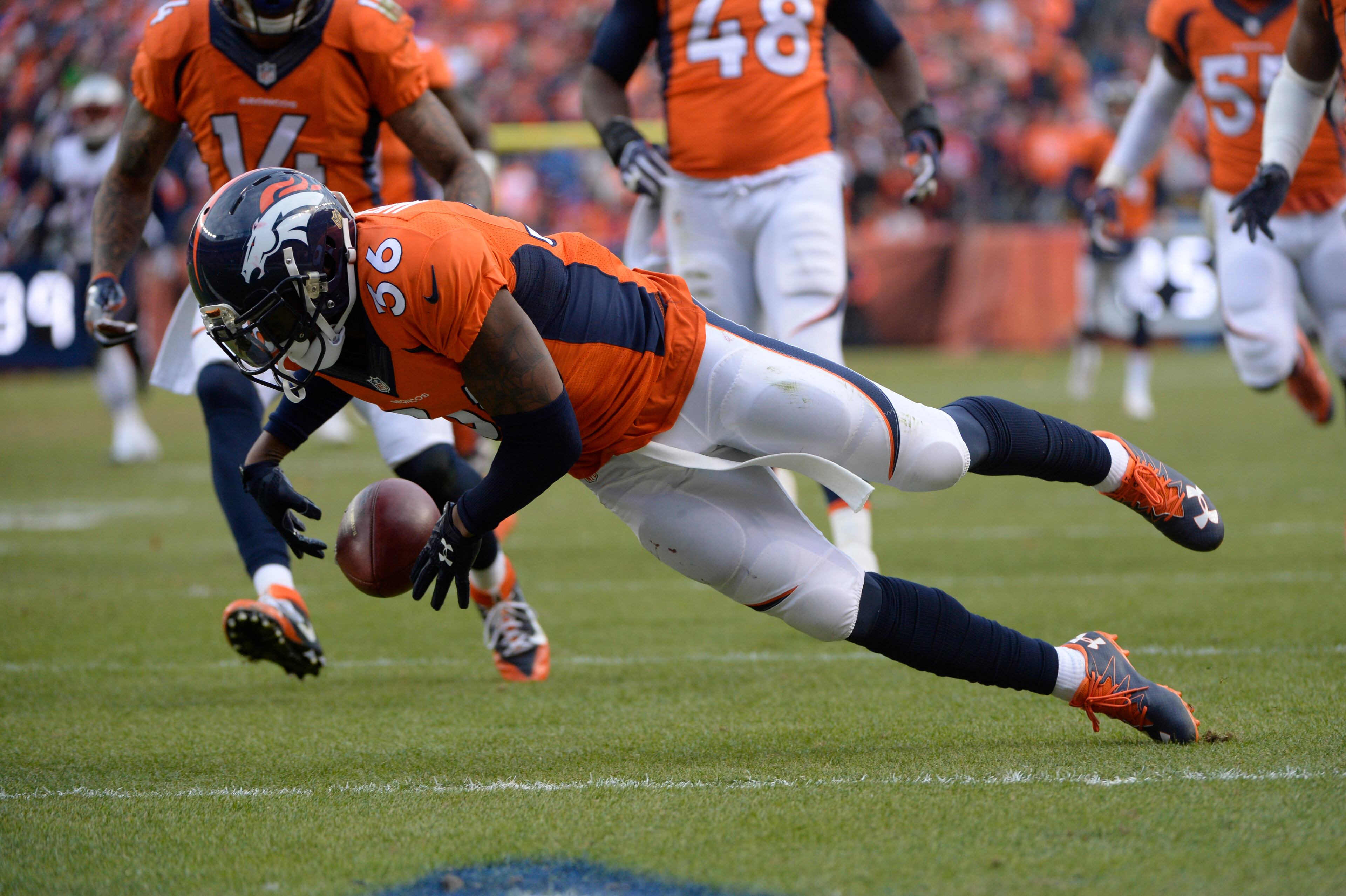 DENVER, CO - JANUARY 24: Kayvon Webster (36) of the Denver Broncos knocks a punt back to the 3 yard line in the third quarter. The Denver Broncos played the New England Patriots in the AFC championship game at Sports Authority Field at Mile High in Denver, CO on January 24, 2016. (Photo by AAron Ontiveroz/The Denver Post via Getty Images)