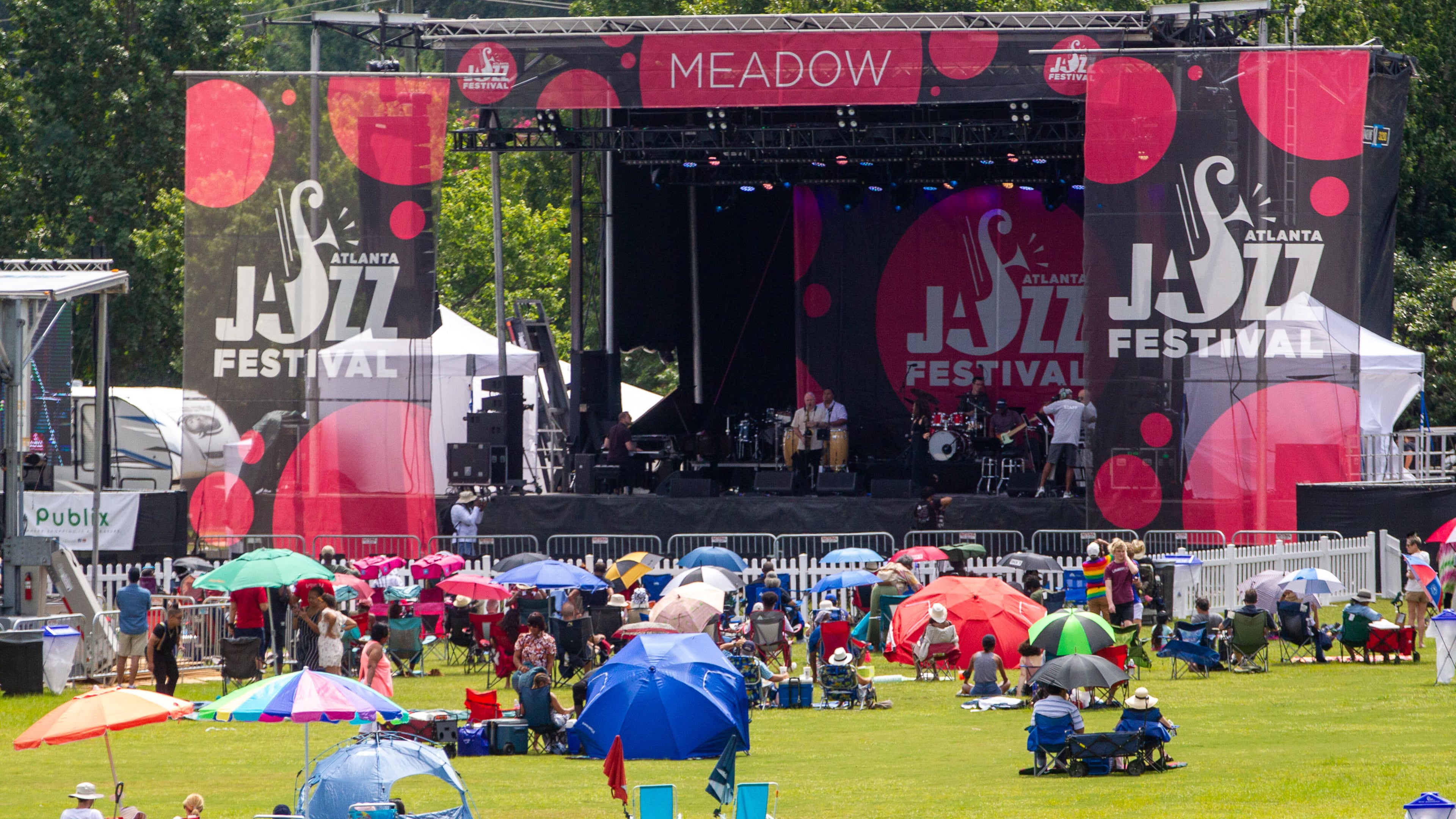 People listen to music on the Meadow Stage during the Atlanta Jazz Festival in Piedmont Park on Sunday, September 5, 2021. STEVE SCHAEFER FOR THE ATLANTA JOURNAL-CONSTITUTION
