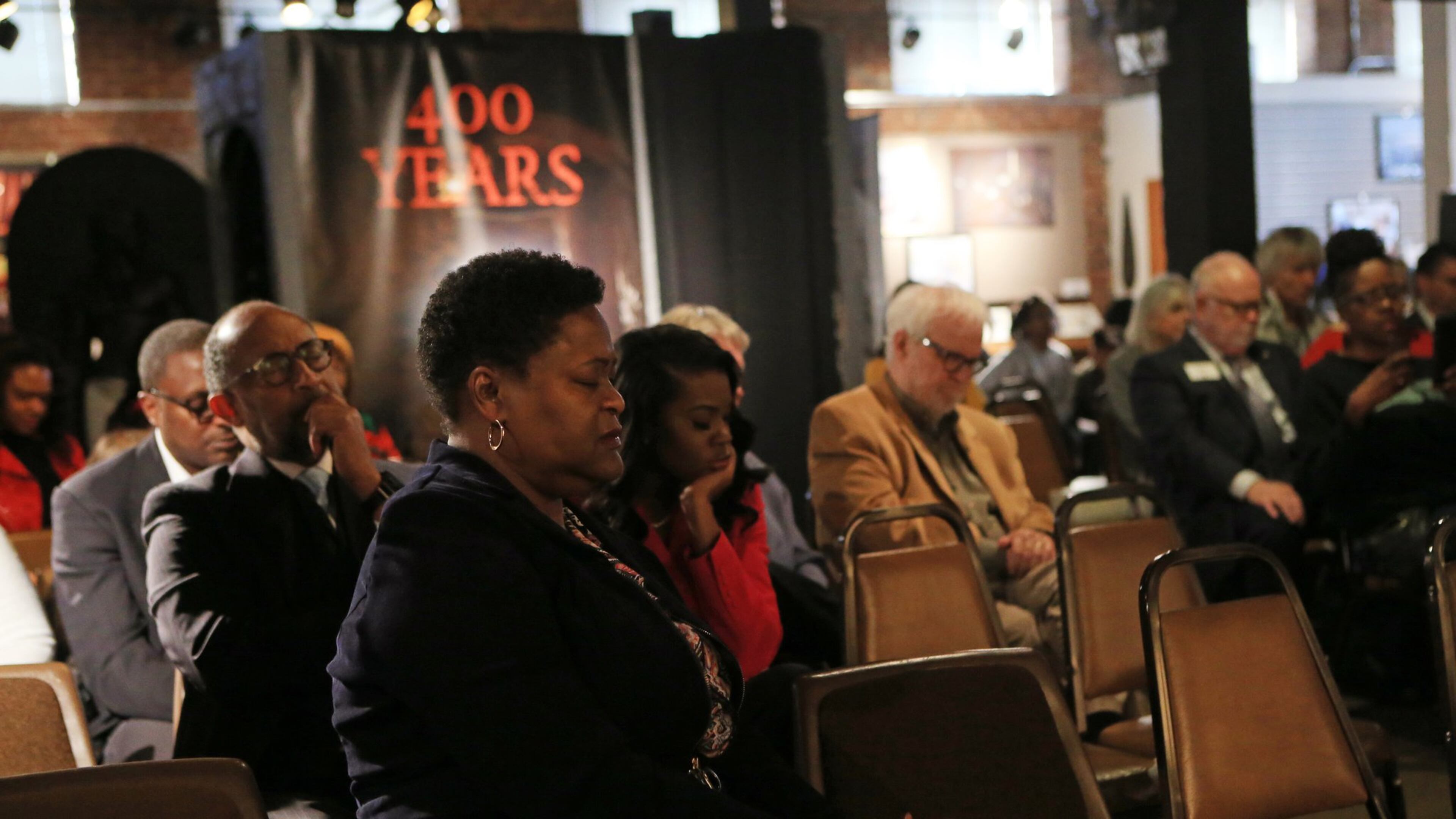 Felicia Moore, president of the Atlanta City Council, prays during a vigil for U.S. Rep. John Lewis on Sunday, January 12, 2020, at the APEX Museum in Atlanta. Lewis has been diagnosed with stage 4 pancreatic cancer. (Photo: Christina Matacotta/Special to the AJC)