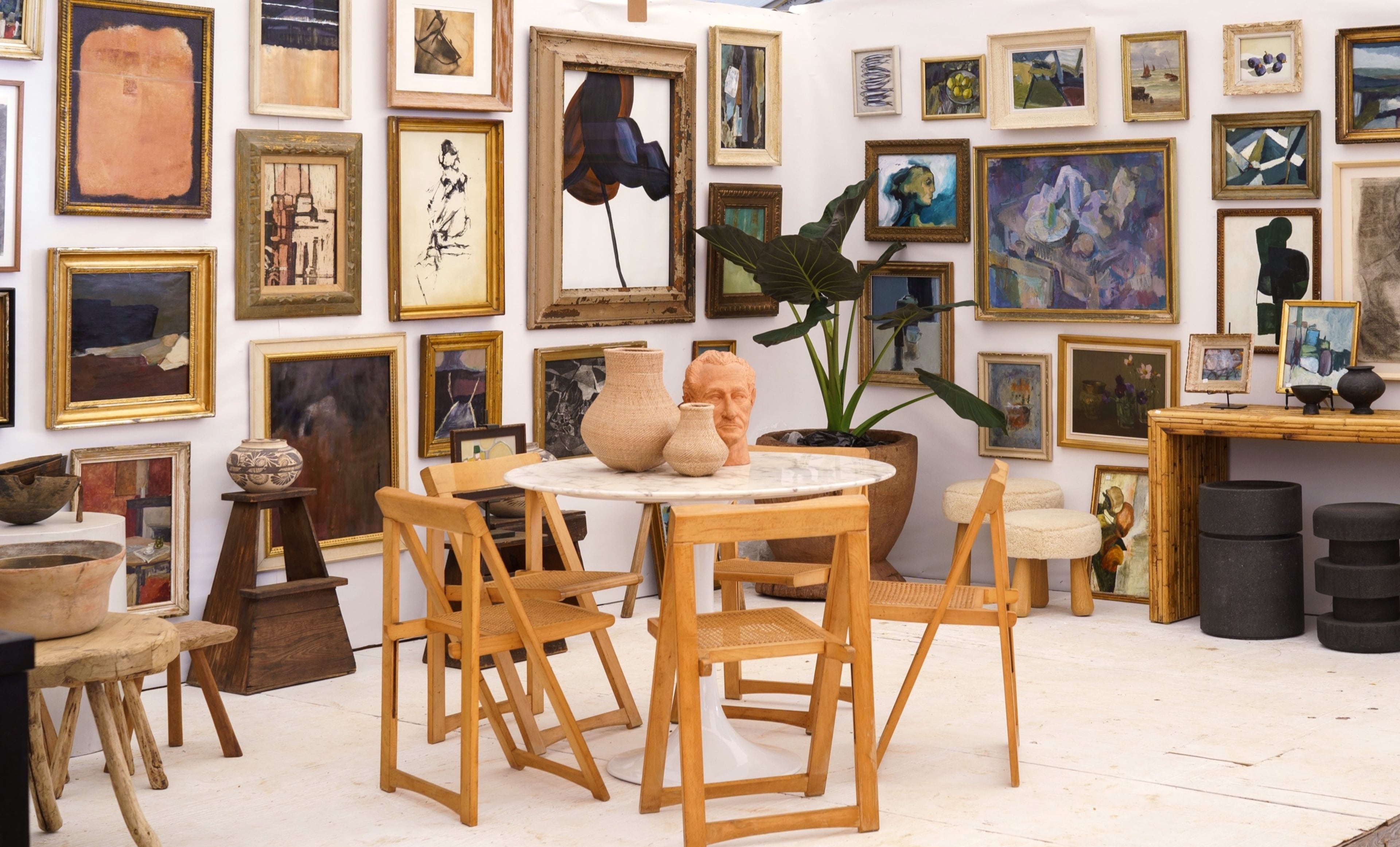 A booth at the Marburger Antique & Design show displays vintage art. One hundred dealers from across the country will be in Atlanta for the 2025 show, July 15-19. (Courtesy of Marburger Antique & Design Show)
