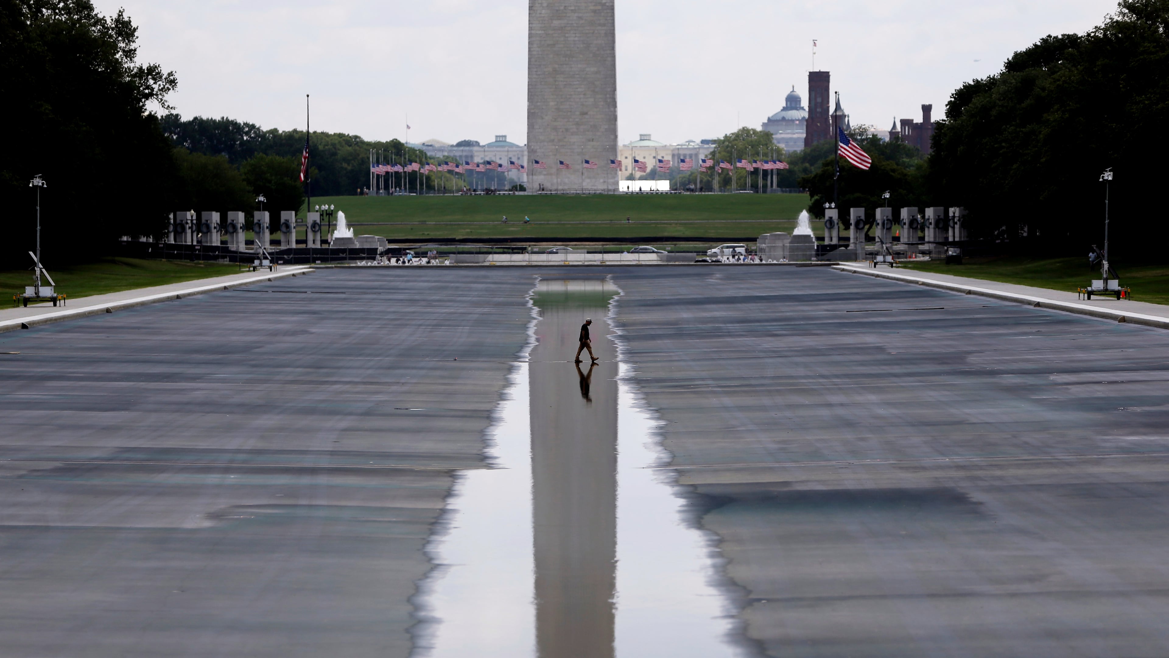 The Washington Monument is seen in the background of the now drained Lincoln Memorial Reflecting Pool, Wednesday, July 29, 2026, in Washington. (AP Photo/Rahmat Gul)