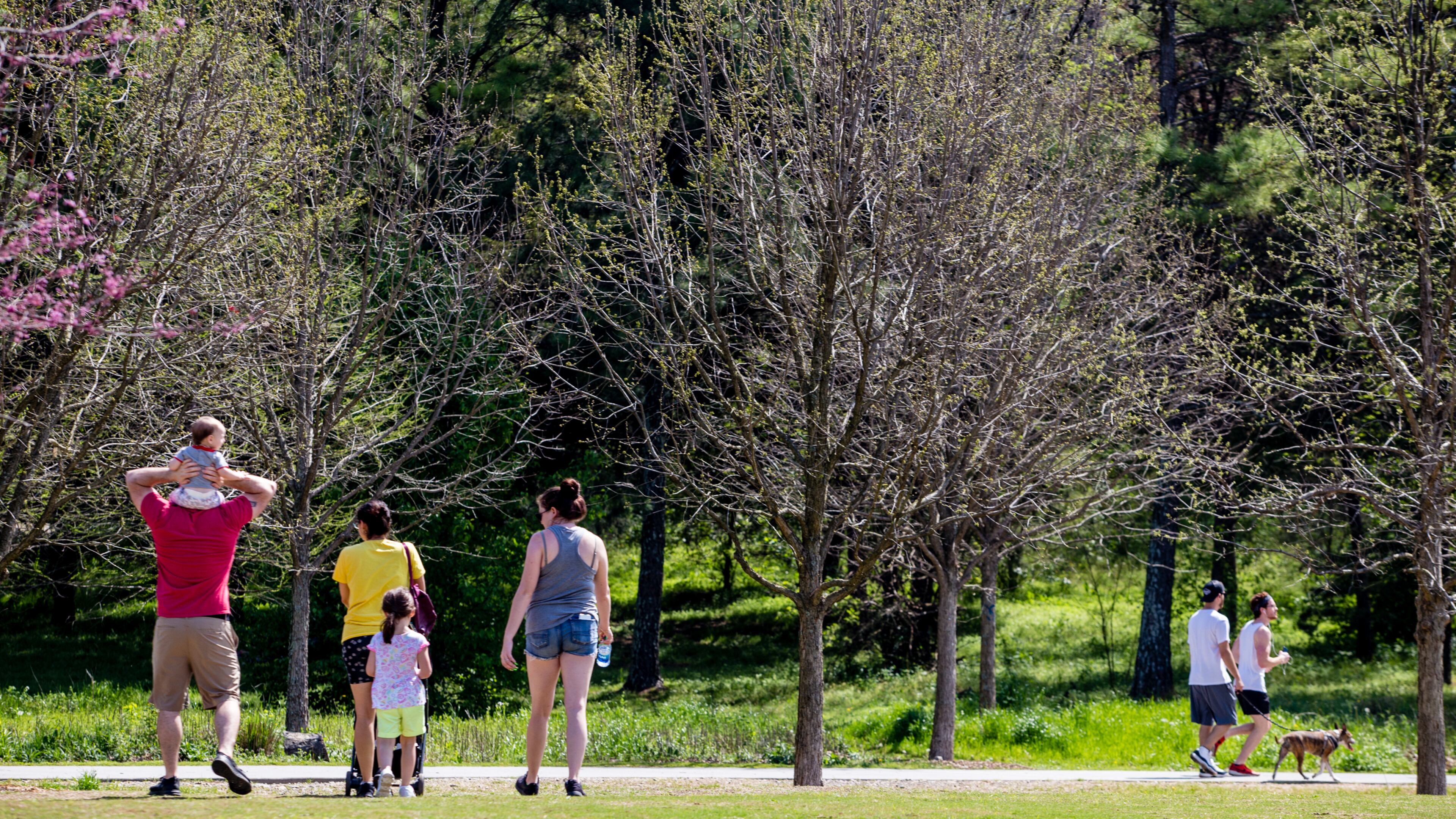 Out and about on the Atlanta Beltline near the skatepark on March 27, 2020, people seemed to be keeping appropriate social distance. The Beltline’s CEO said the trails should be used as a “transportation corridor” for people who need to go to work, get groceries, medical supplies and services — not for recreation for the cabin fevered — as the coronavirus continued to upend everyday life. (Jenni Girtman for The Atlanta Journal-Constitution)